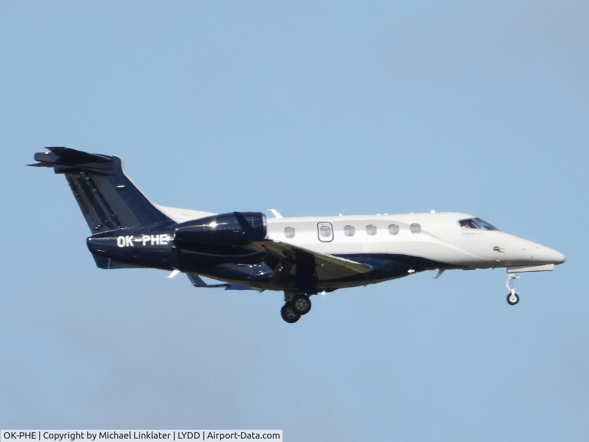 OK-PHE, 2011 Embraer EMB-505 Phenom 300 C/N 50500062, Landing at Lydd airfield Kent UK  4/2/2023