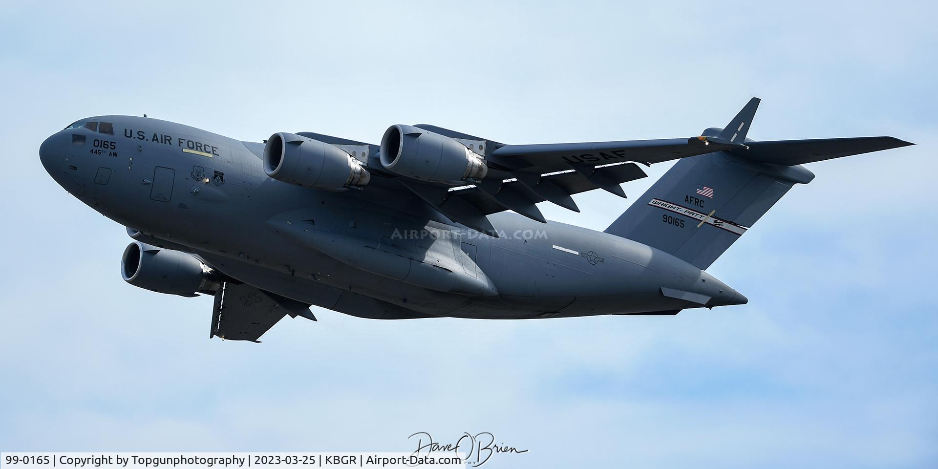 99-0165, 1999 Boeing C-17A Globemaster III C/N 50069/P-65, RHINO90 off the deck heading to Canada