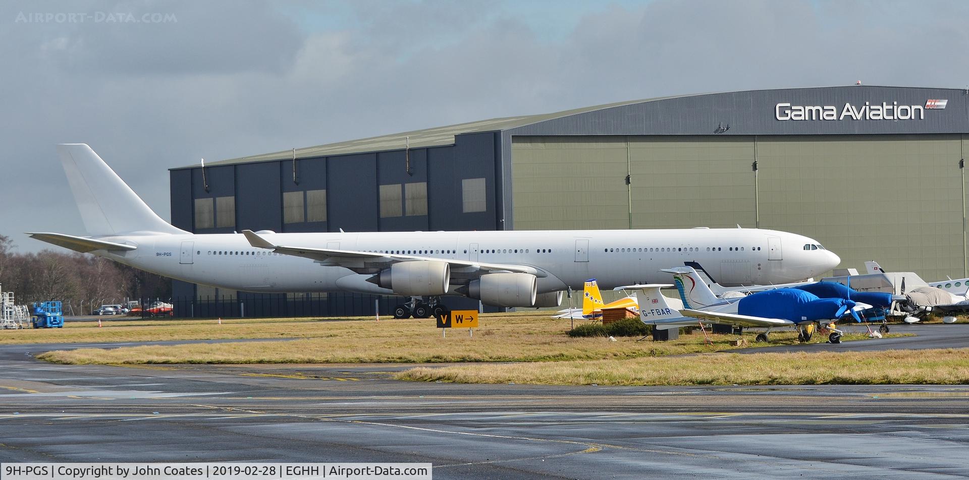 9H-PGS, 2009 Airbus A340-642X C/N 1030, Being readied for work