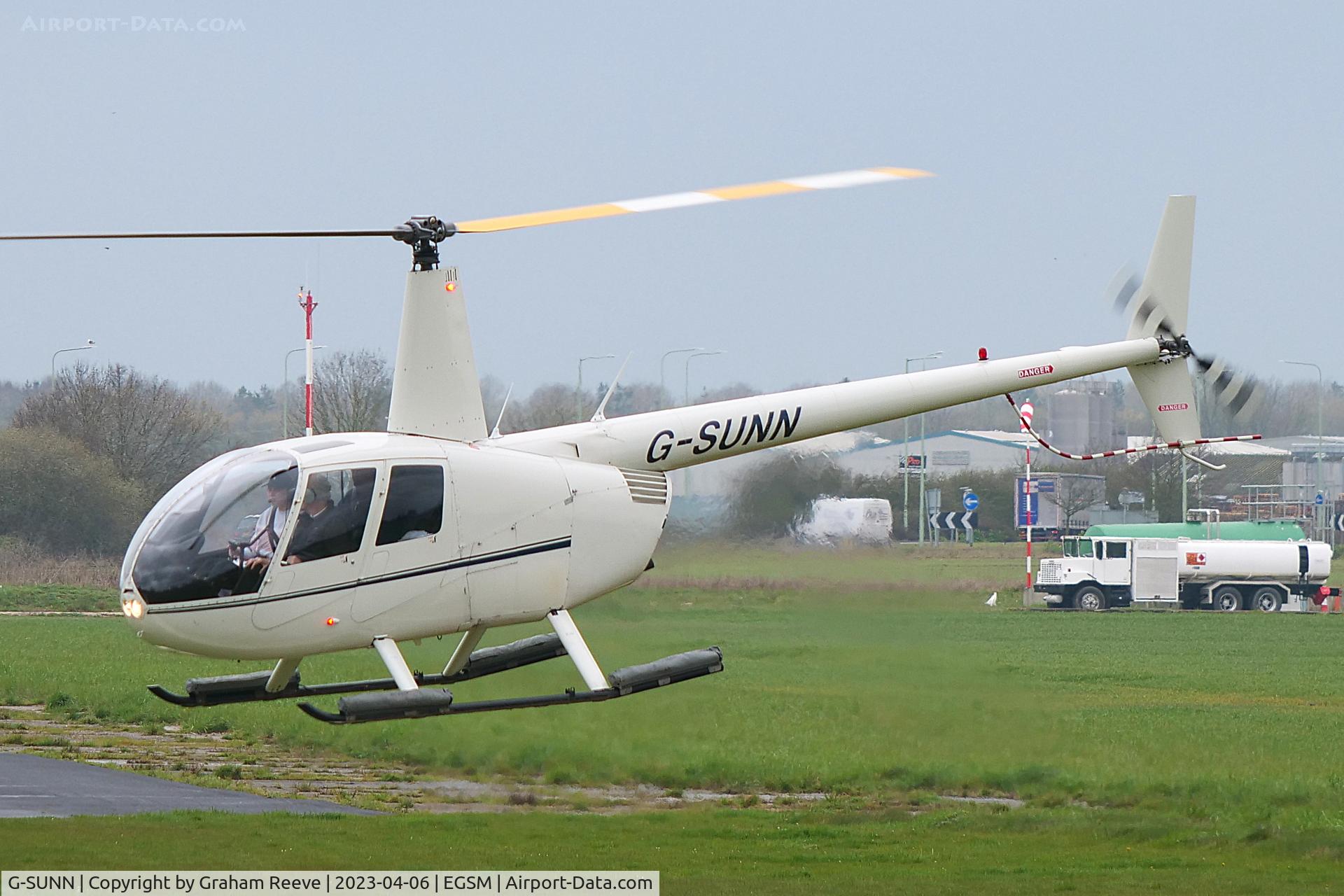 G-SUNN, 2004 Robinson R44 Clipper C/N 1367, Landing at Beccles.
