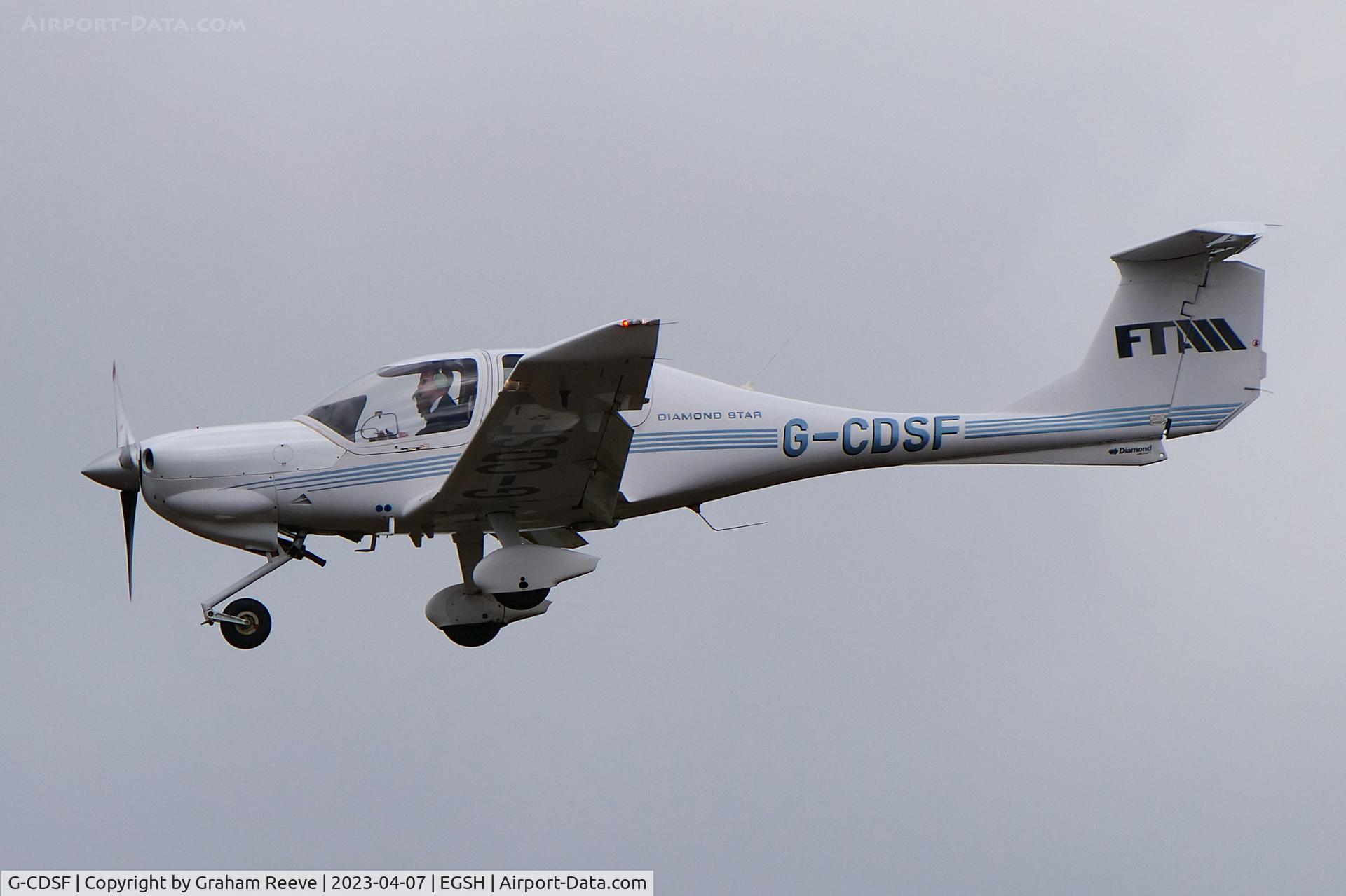G-CDSF, 2005 Diamond DA-40D Diamond Star C/N D4.190, Landing at Norwich, now with logo on the tail.