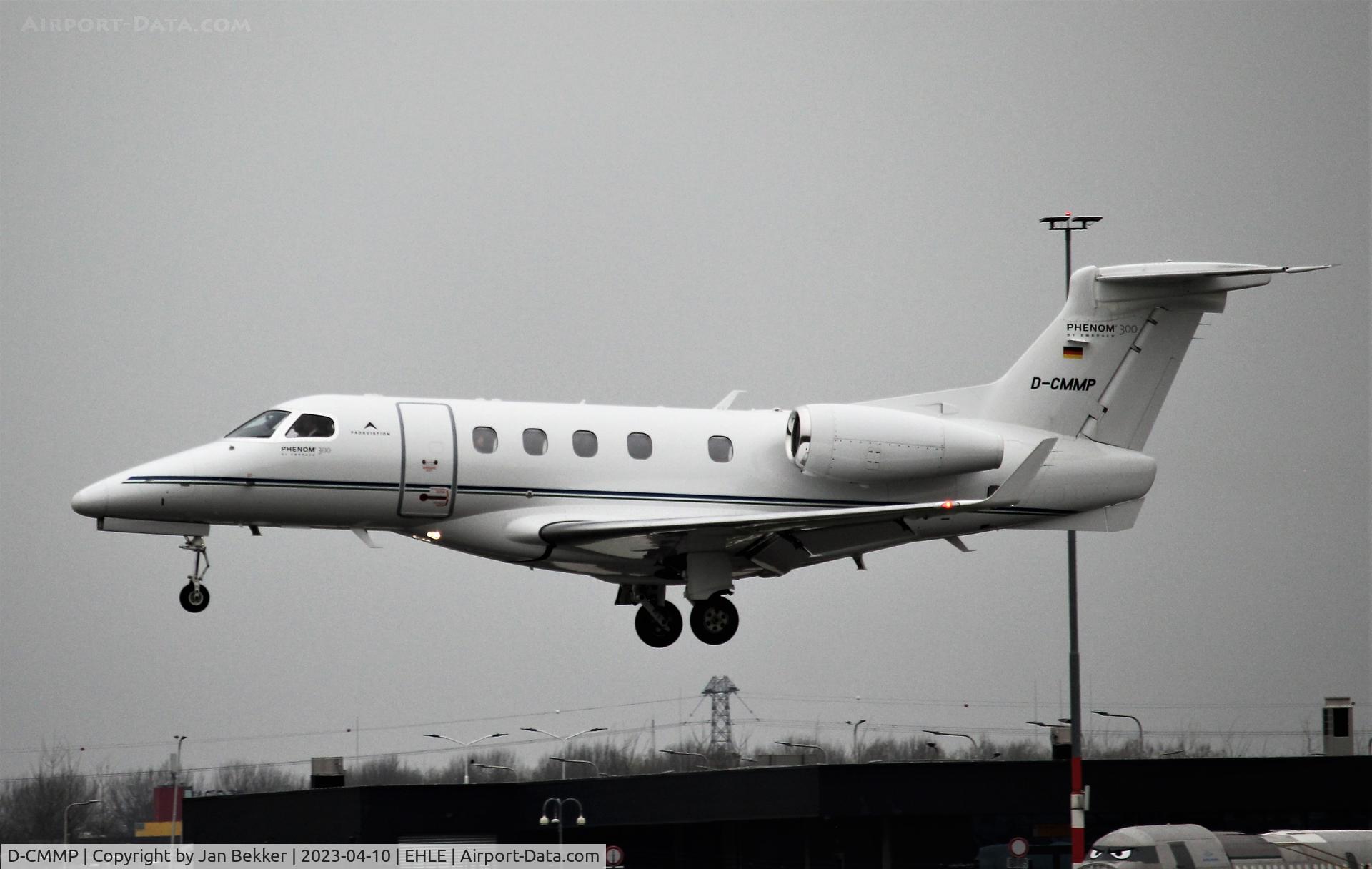 D-CMMP, 2016 Embraer EMB-505 Phenom 300 C/N 50500360, Arriving at Lelystad Airport in the rain from Sion