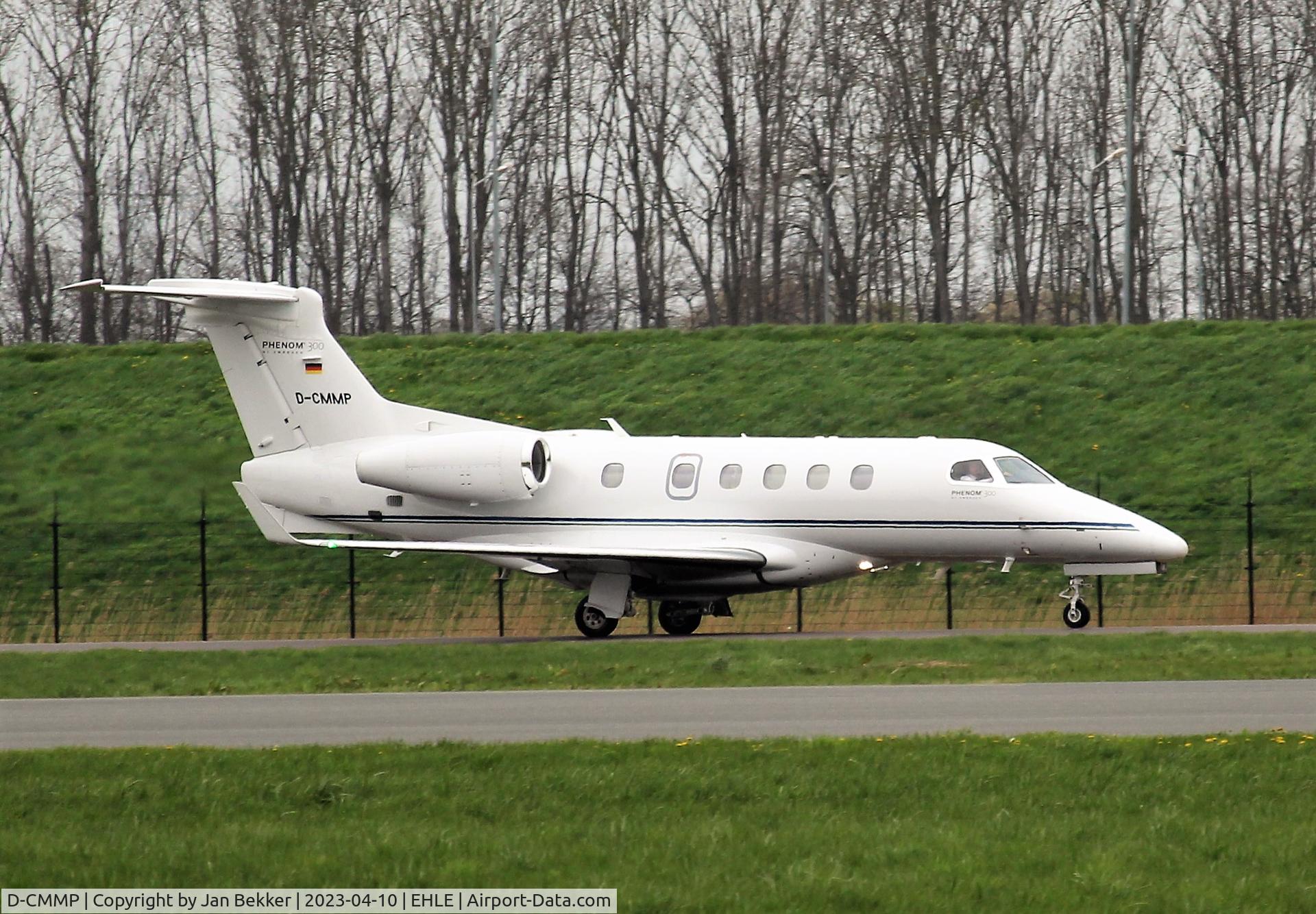 D-CMMP, 2016 Embraer EMB-505 Phenom 300 C/N 50500360, Arriving at Lelystad Airport in the rain from Sion