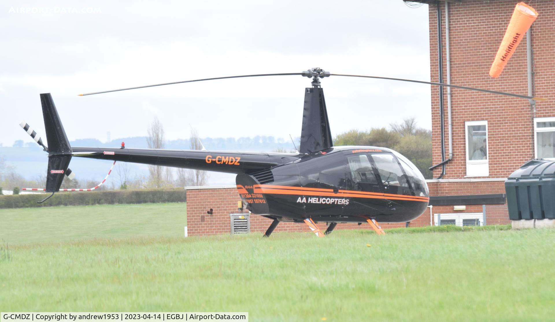 G-CMDZ, 2001 Robinson R44 Raven II C/N 0966, G-CMDZ at Gloucestershire Airport.