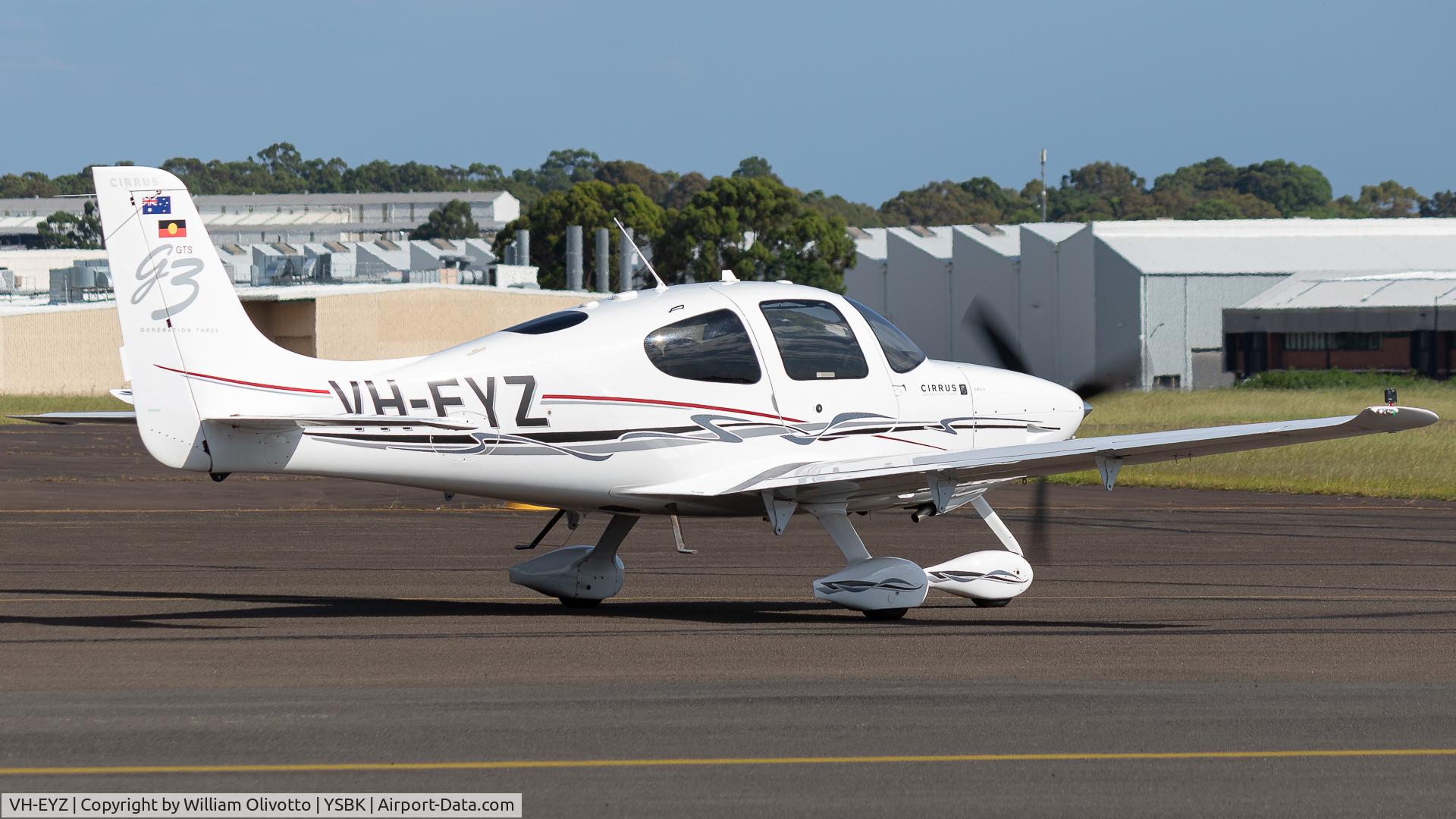 VH-EYZ, 2004 Cirrus SR22 C/N 0851, EYZ taxiing via KILO for a 11C departure homebound for Moorabin.