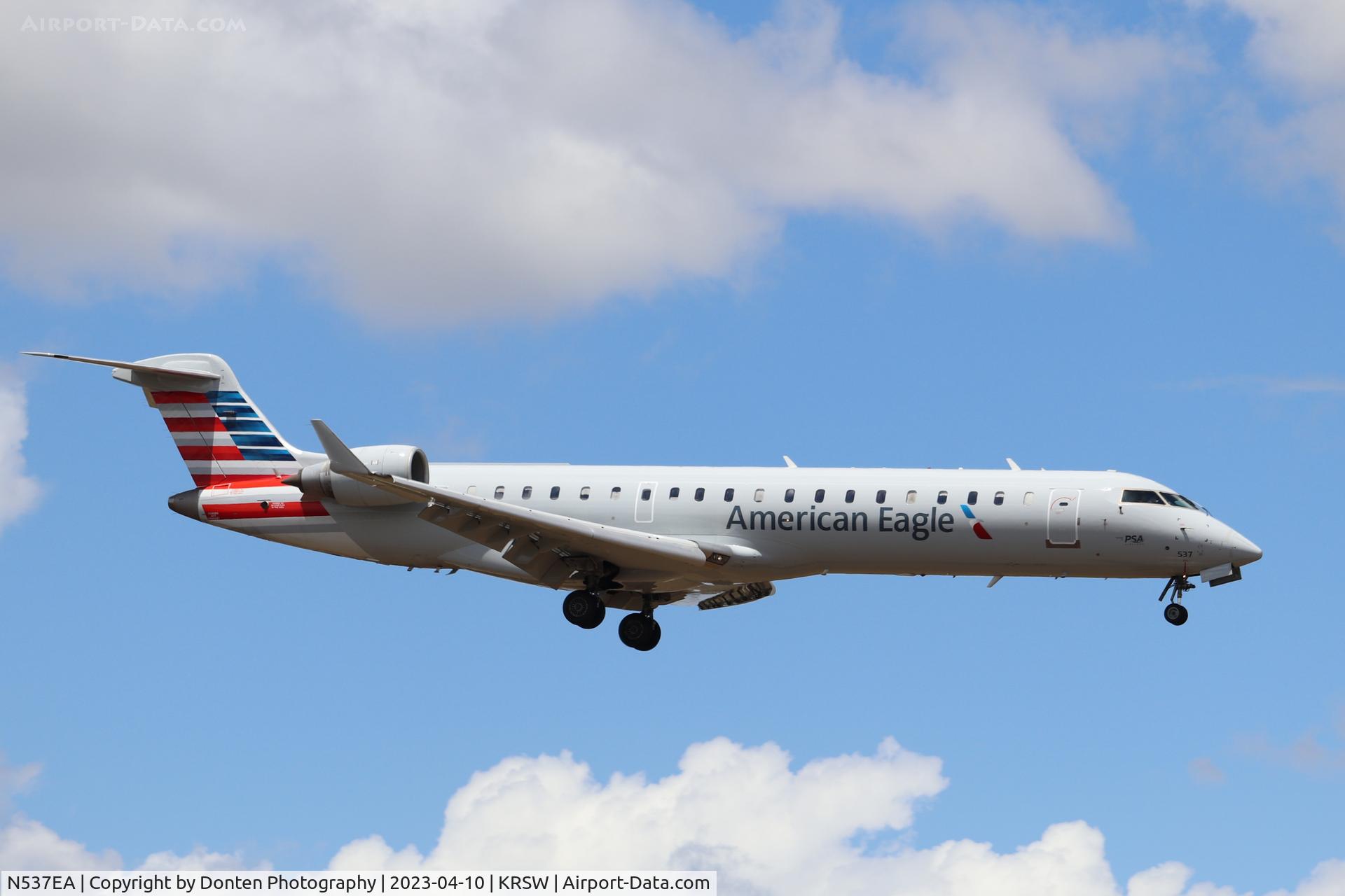 N537EA, Bombardier CRJ-702ER NG (CL-600-2C10) Regional Jet C/N 10316, American Flight 5340 operated by PSA arrives on Runway 6 at Southwest Florida International Airport following flight from Philadelphia International Airport