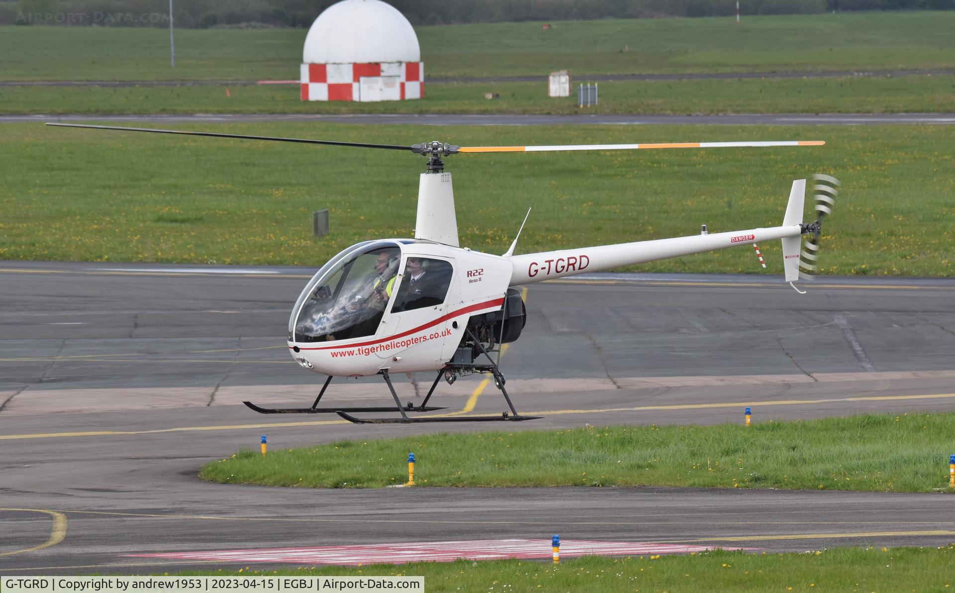 G-TGRD, 1997 Robinson R22 Beta II C/N 2712, G-TGRD at Gloucestershire Airport.