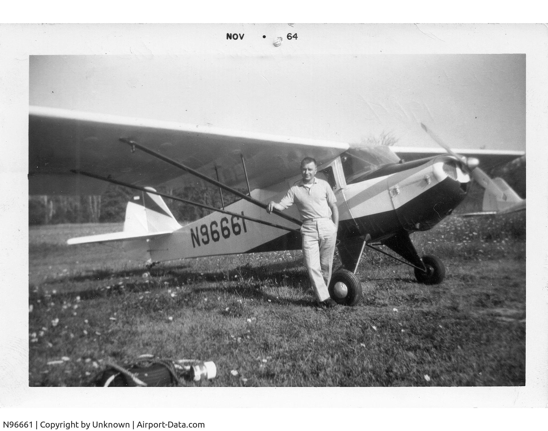 N96661, 1946 Taylorcraft BC12-D C/N 8961, Owner Ralph Mitchell pictured with the plane in the 60s.