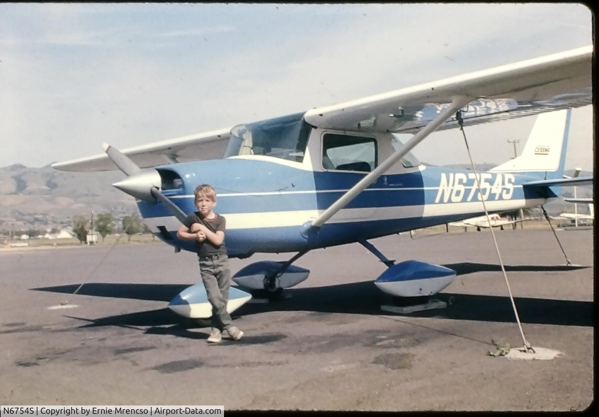 N6754S, 1967 Cessna 150H C/N 15067554, 1970 Photo showing my brother posing with our father's Cessna 150.  I believe he kept it at Reid Hillview Airport in San Jose, Ca.
