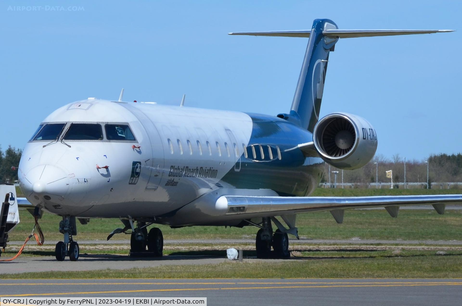 OY-CRJ, 2000 Canadair CRJ-200LR (CL-600-2B19) C/N 7384, Global Reach CL200 parked at BLL