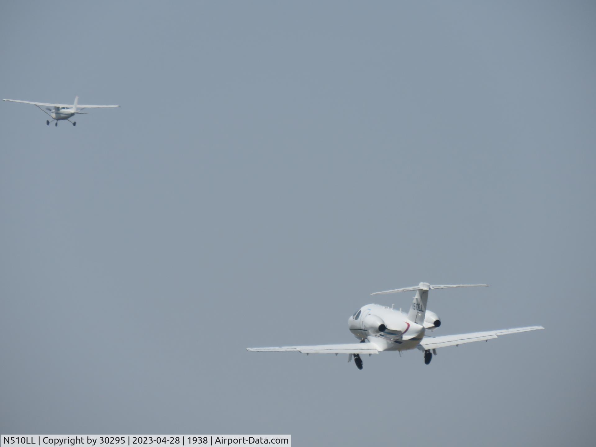 N510LL, 2008 Cessna 510 Citation Mustang C/N 510-0074, Climbing out behind on the left runway behind aircraft on the right runway