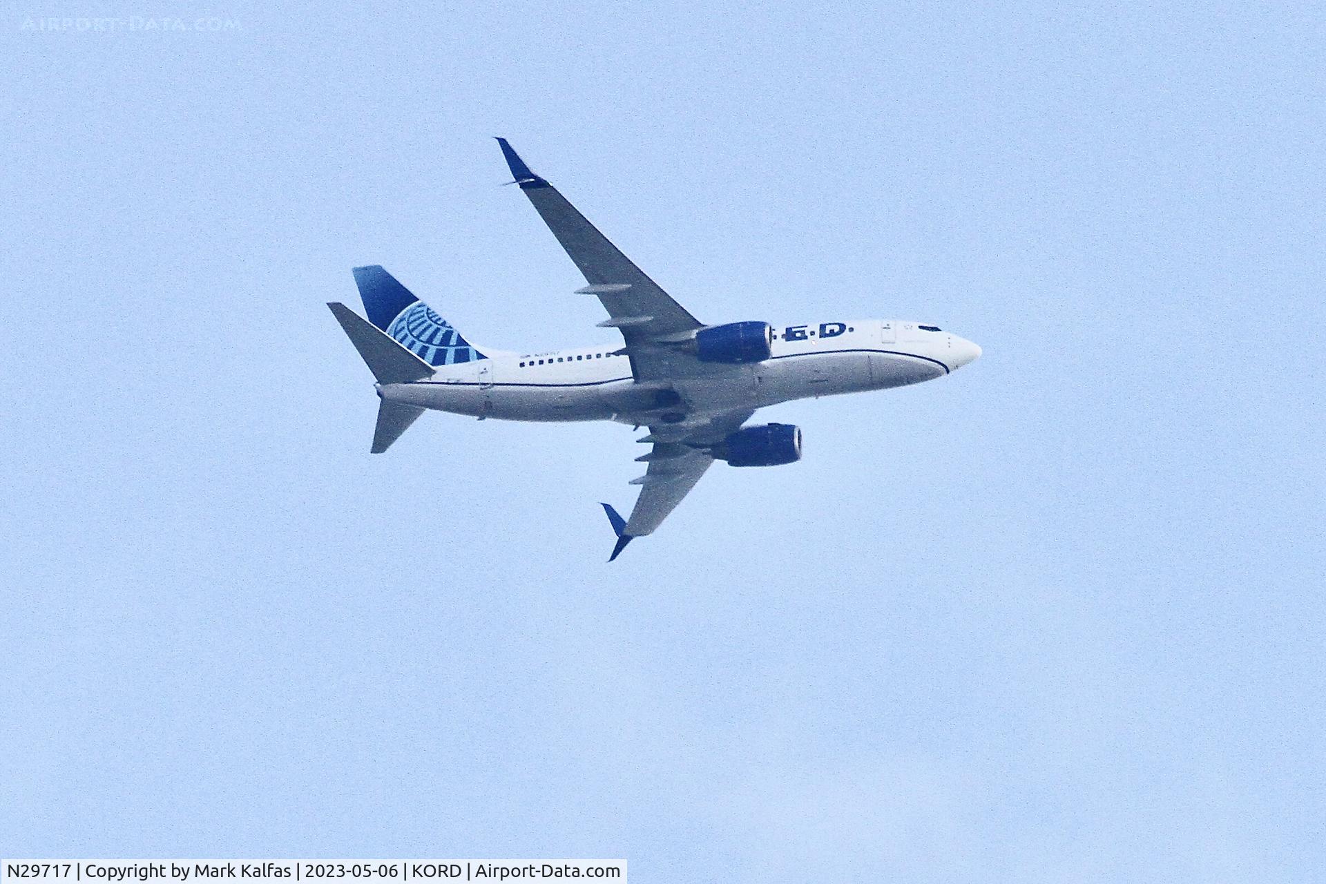 N29717, 1999 Boeing 737-724 C/N 28936, United Airlines Boeing 737-724, N29717 operating as UA #248 arriving from Charlotte Douglas International Airport, on approach to ORD.