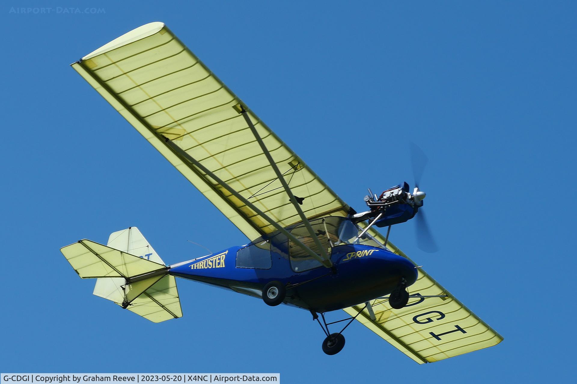 G-CDGI, 2004 Thruster T600N 450 C/N 1041-T600N-108, Departing from North Coates.