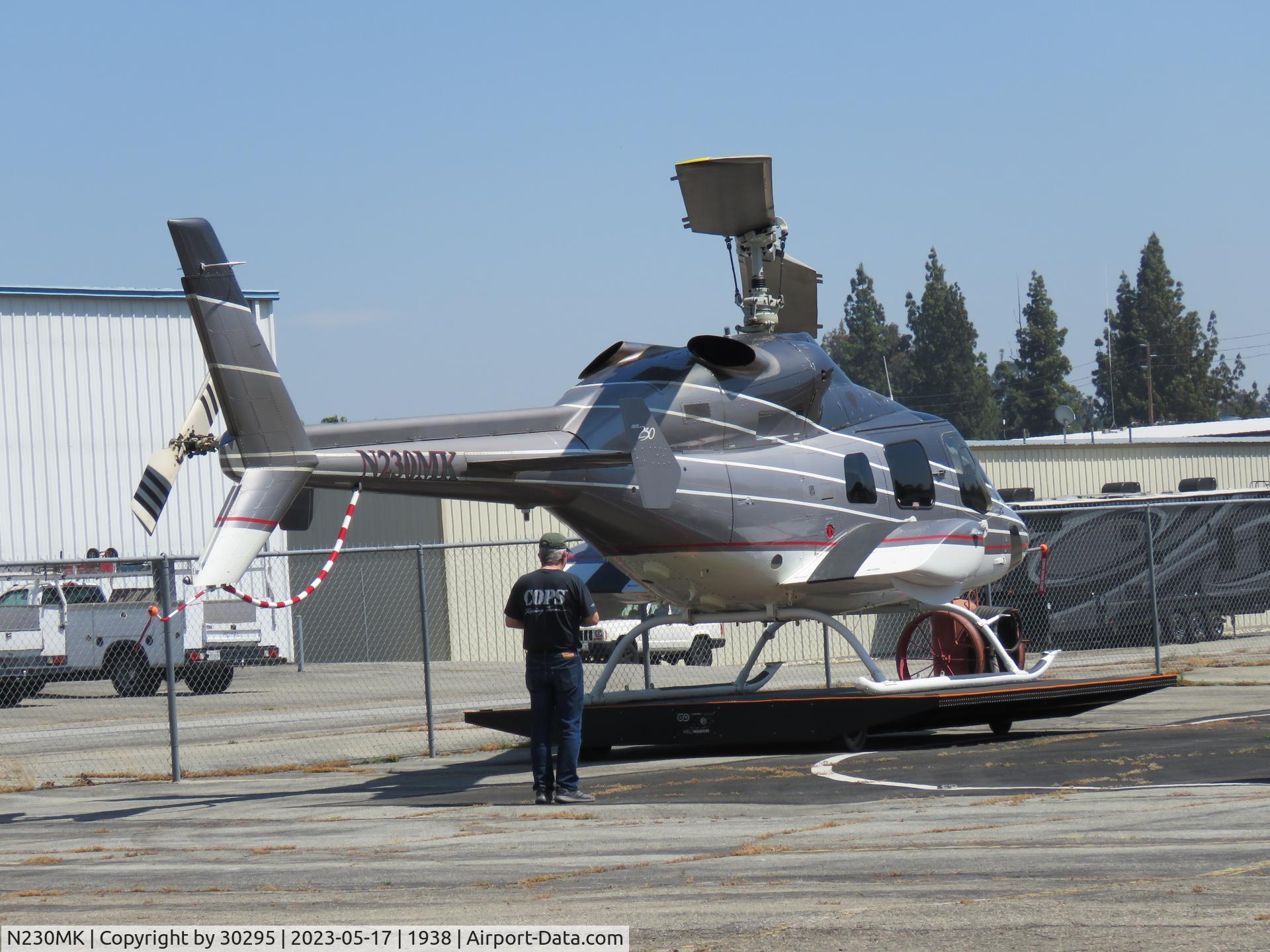 N230MK, 1995 Bell 230 C/N 23035, Moving on motorized dolly