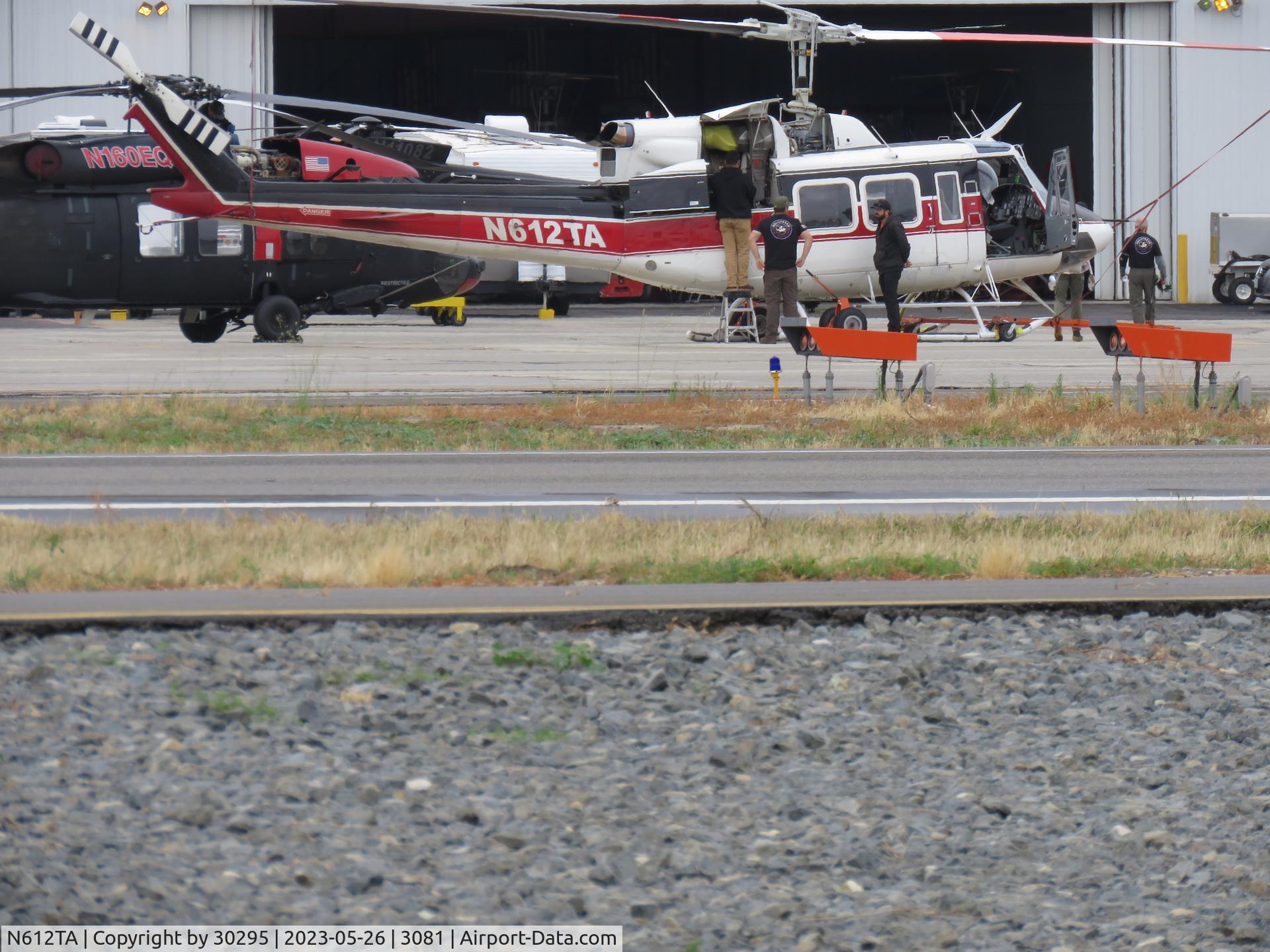 N612TA, 1974 Bell 212 C/N 30624, Parked and being worked on