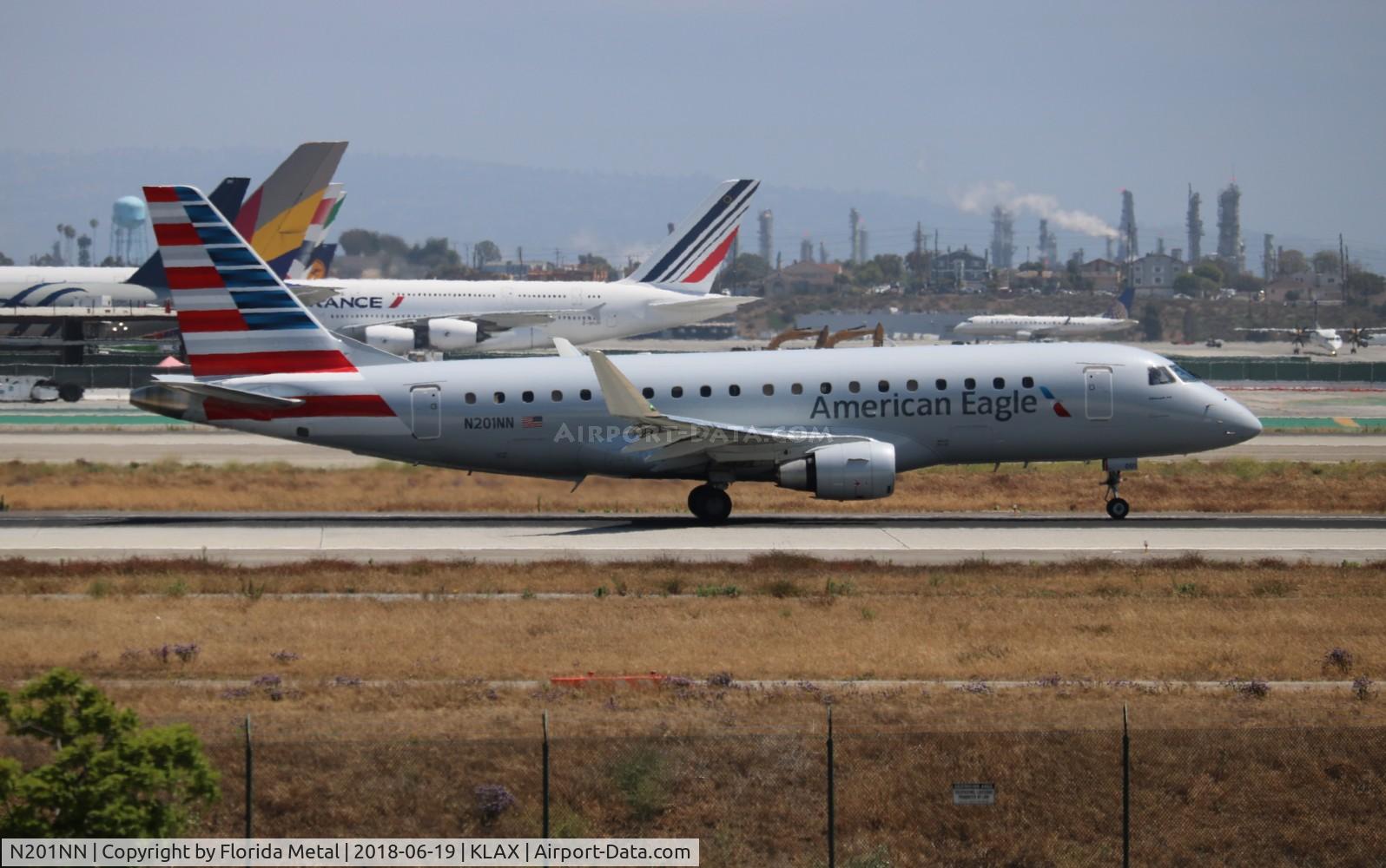 N201NN, 2015 Embraer 175LR (ERJ-170-200LR) C/N 17000461, Compass/Eagle E175 zx LAX bridge