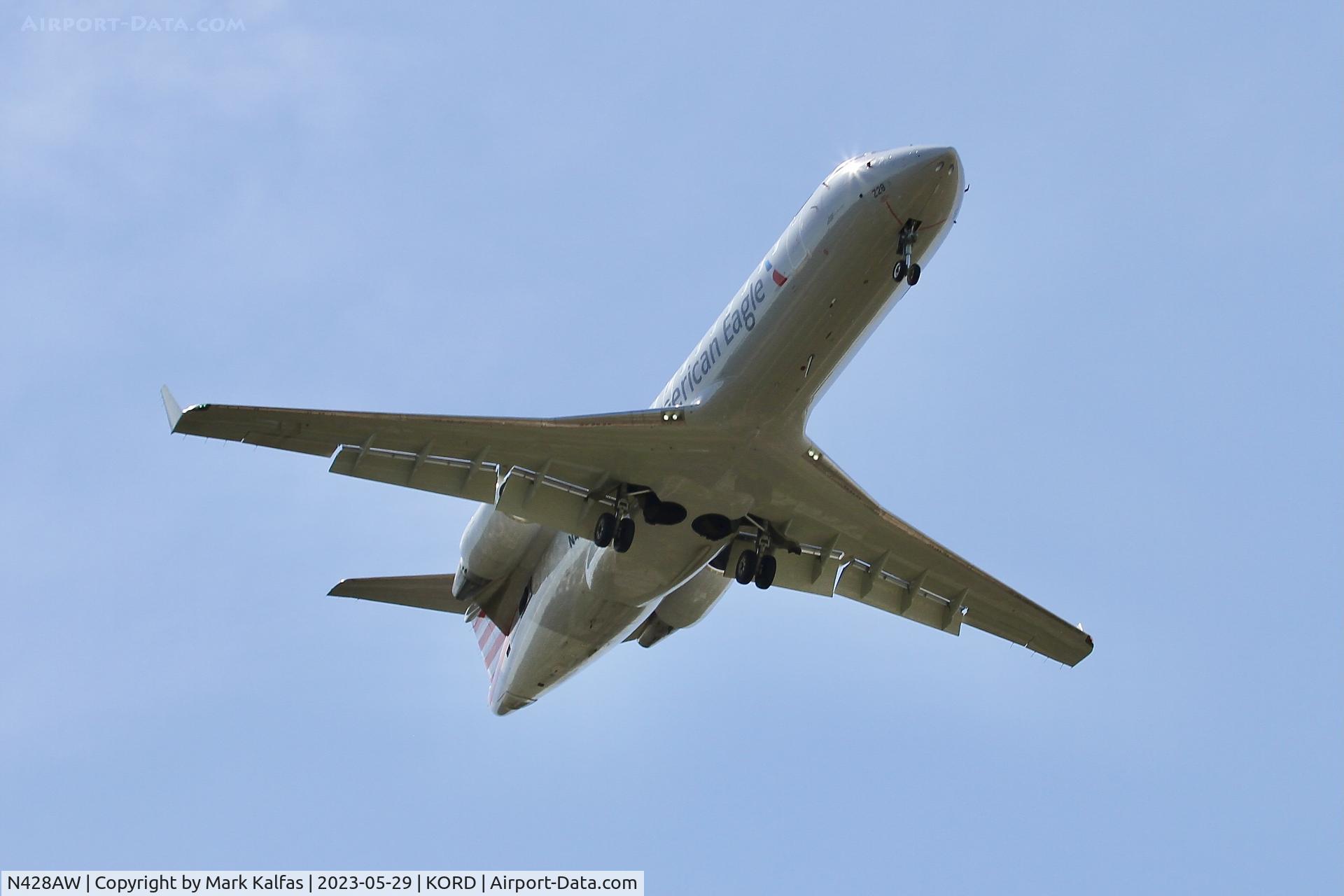 N428AW, 2002 Bombardier CRJ-200LR (CL-600-2B19) C/N 7695, Air Wisconsin/American Eagle CRJ2 N428AW AWI6197 PIA-ORD, on approach to 10C KORD
