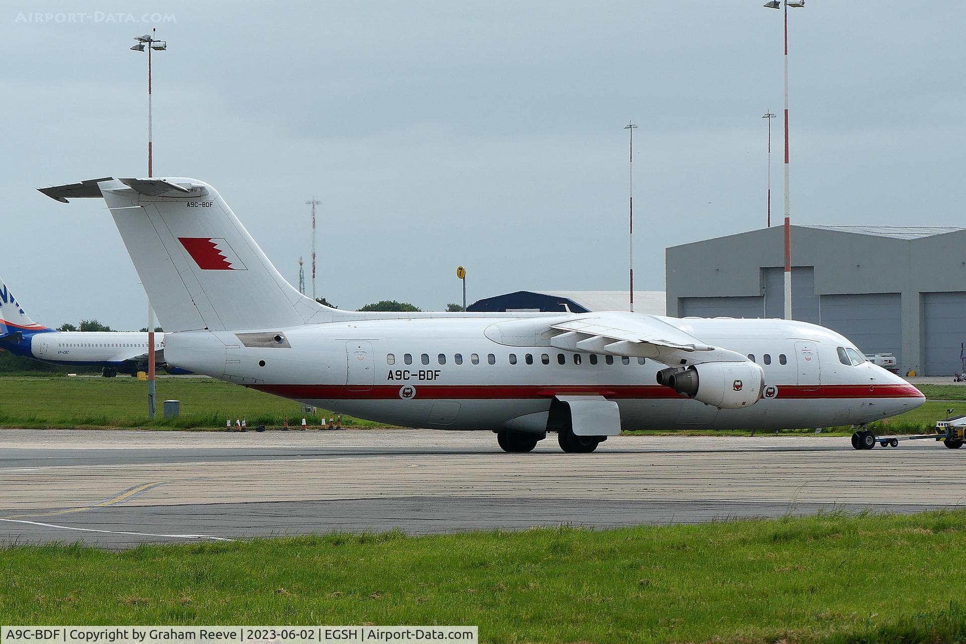 A9C-BDF, 2001 BAE Systems Avro 146-RJ85 C/N E.2390, Under tow at Norwich.