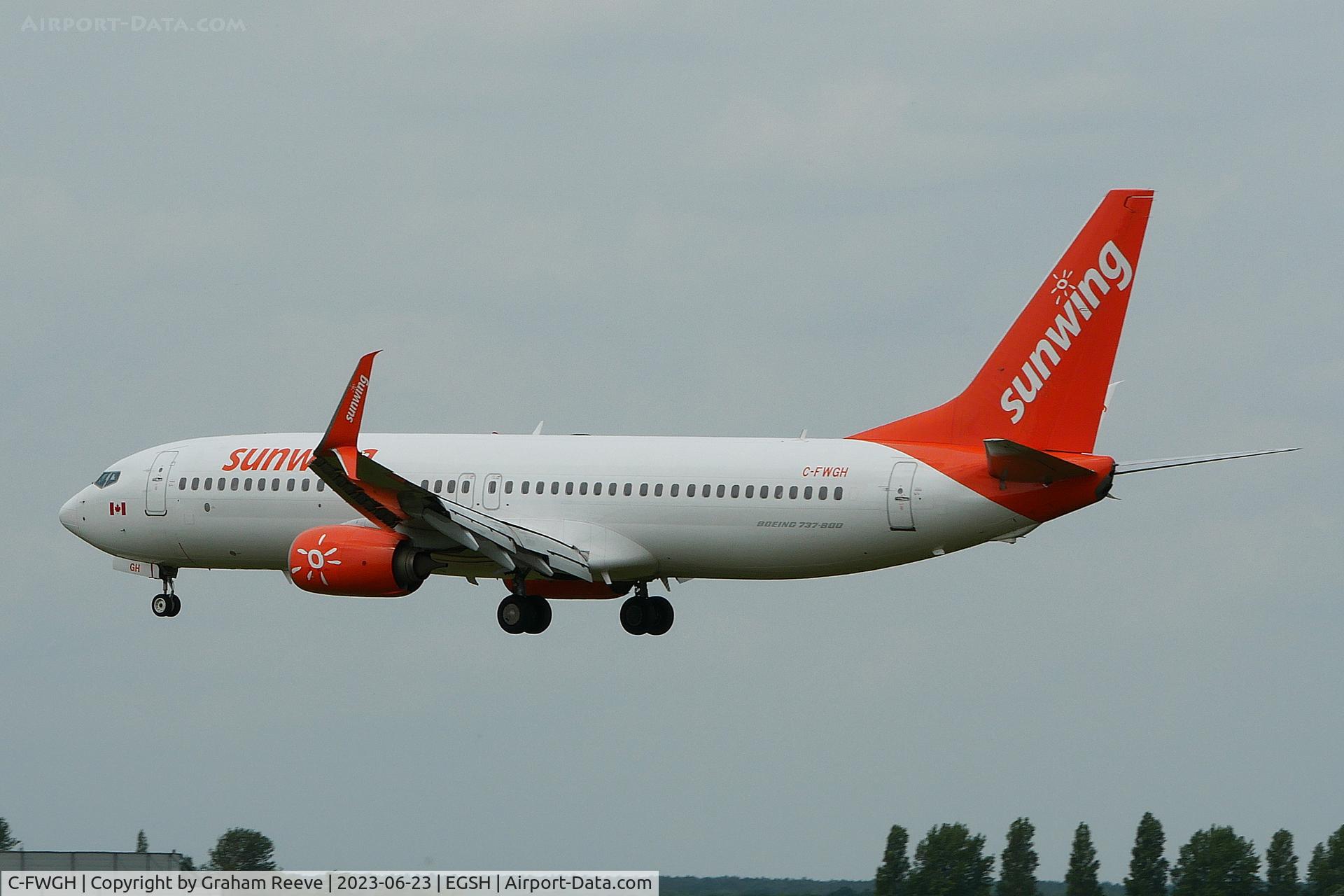 C-FWGH, 2011 Boeing 737-86J C/N 37752, Landing at Norwich.