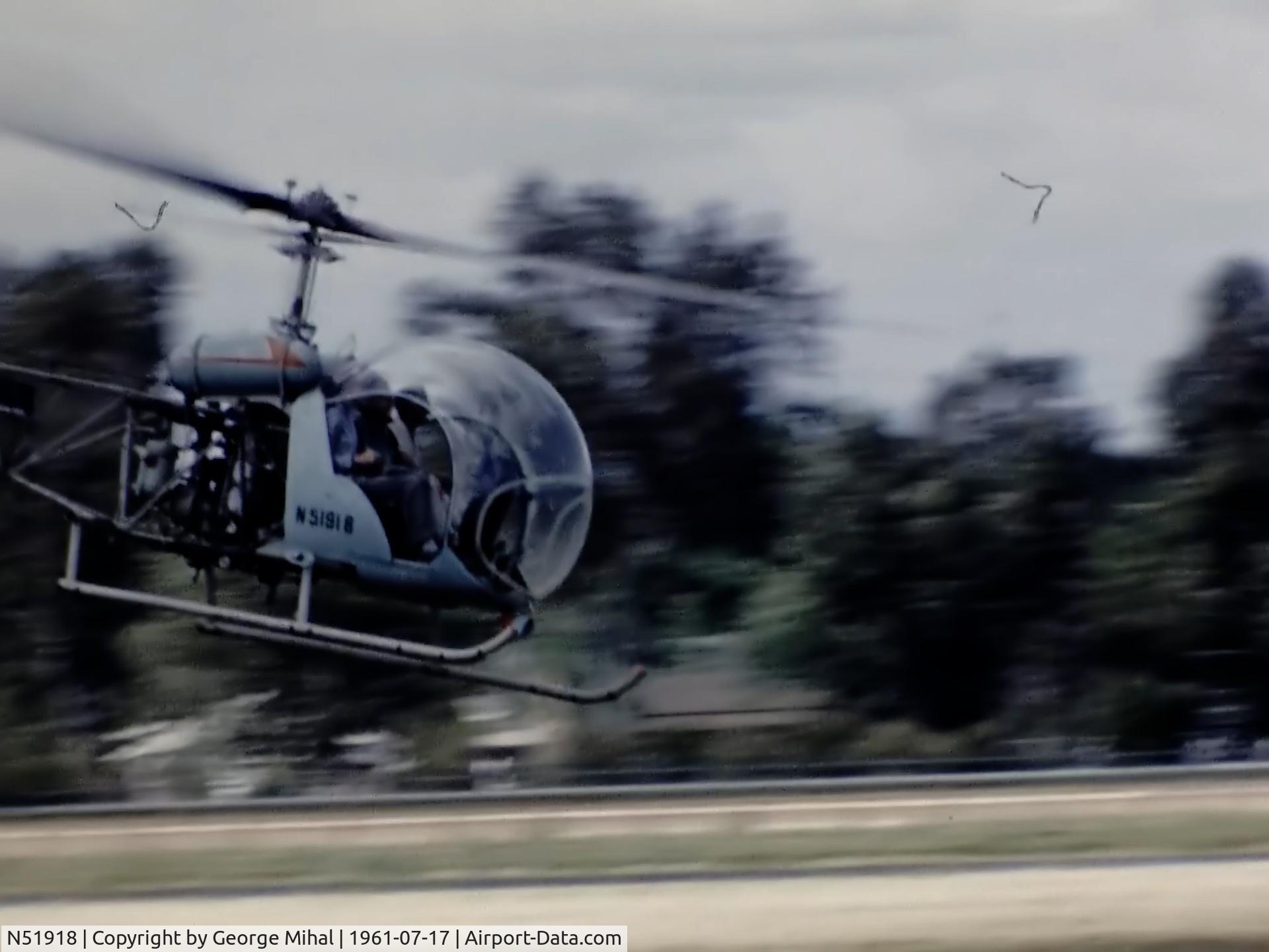 N51918, Bell 47 C/N N51918, This is a screen shot taken from 16mm film I am producing for YouTube. The aircraft has just lifted off from the race track at the California State Fairgrounds in Sacramento.