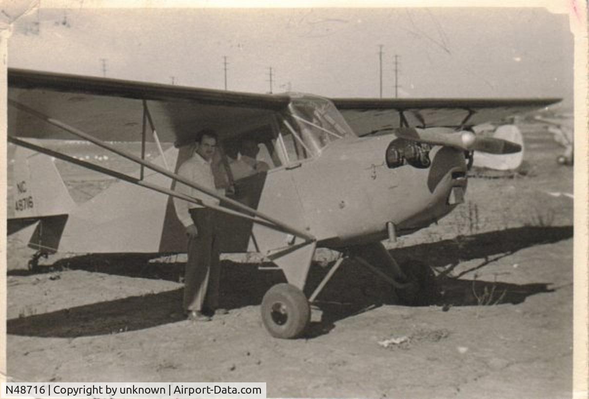 N48716, 1942 Aeronca 0-58B Grasshopper C/N 058B-6452, My dad's old photo digitized.
February 1946 at long gone Gardena Airport  (formerly DYCER airport)
Near 136th & Western Ave in Gardena California