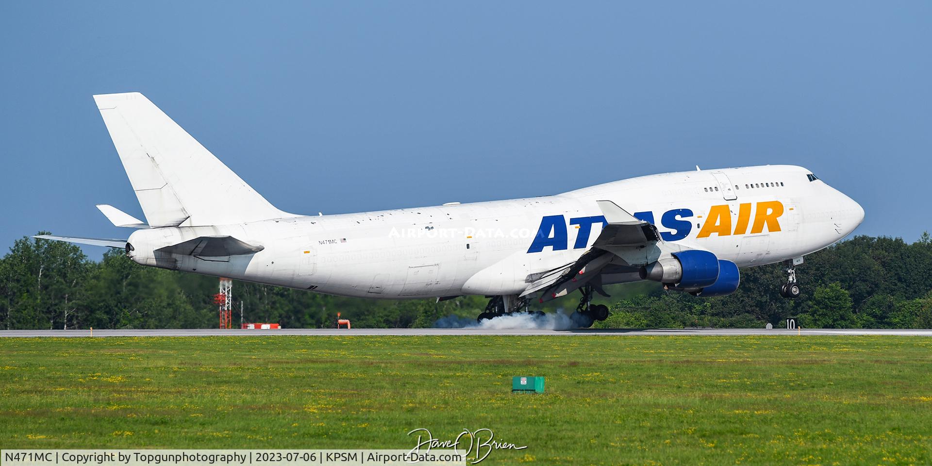 N471MC, 1997 Boeing 747-412 C/N 26557, touching down in NH