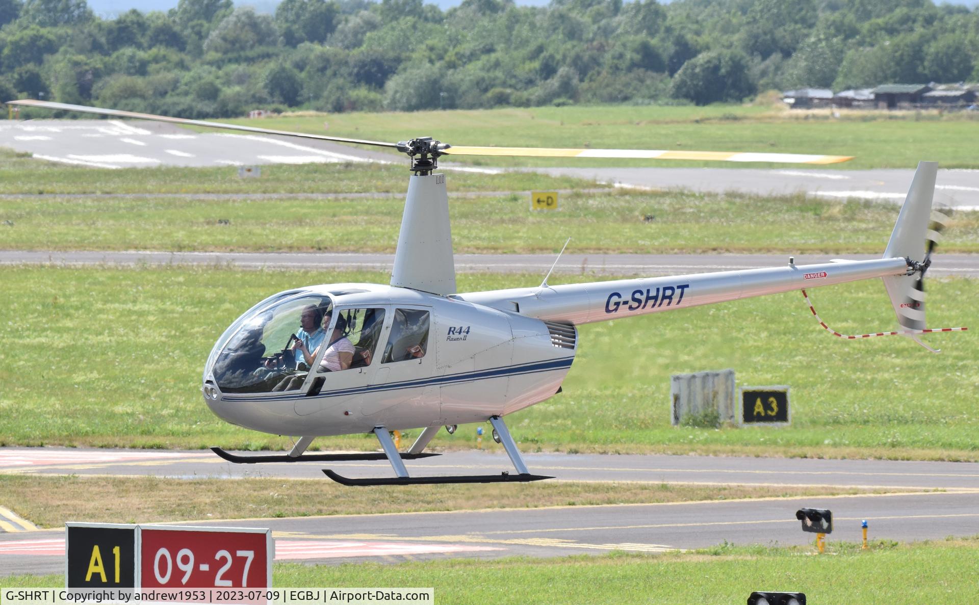 G-SHRT, 2004 Robinson R44 II C/N 10473, G-SHRT at Gloucestershire Airport.