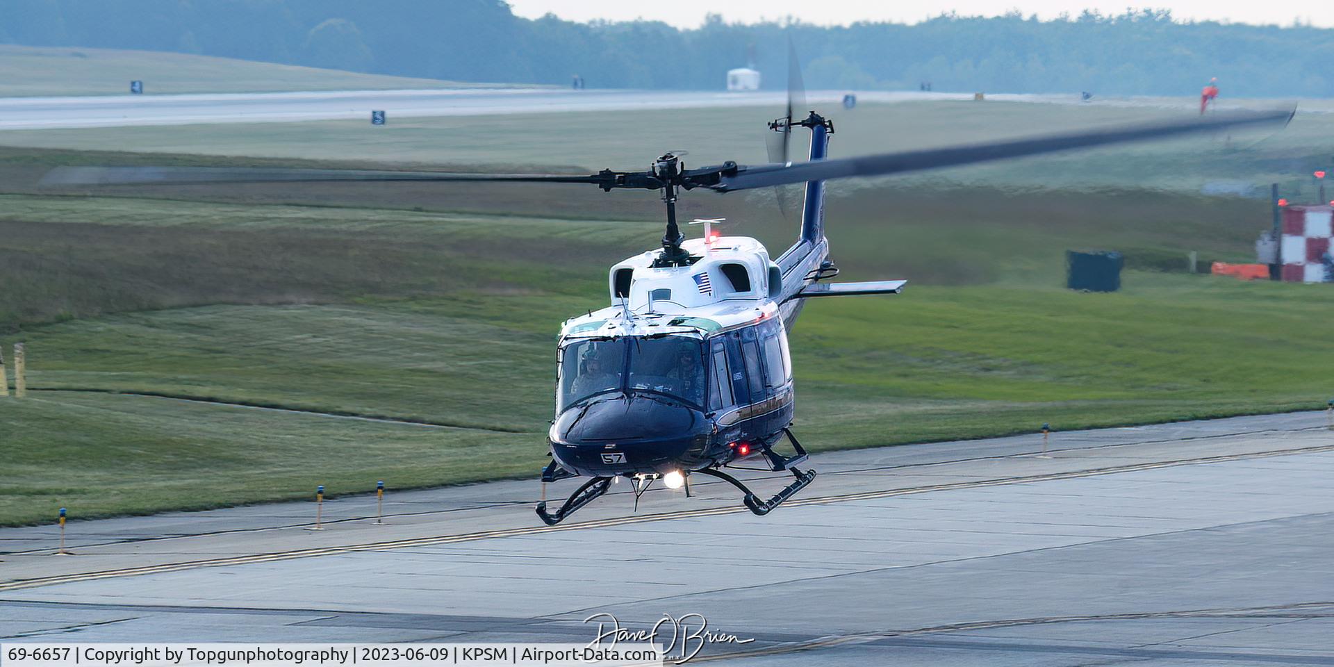 69-6657, 1969 Bell UH-1N Iroquois C/N 31063, MUSEL14 departing from the Alpha taxiway