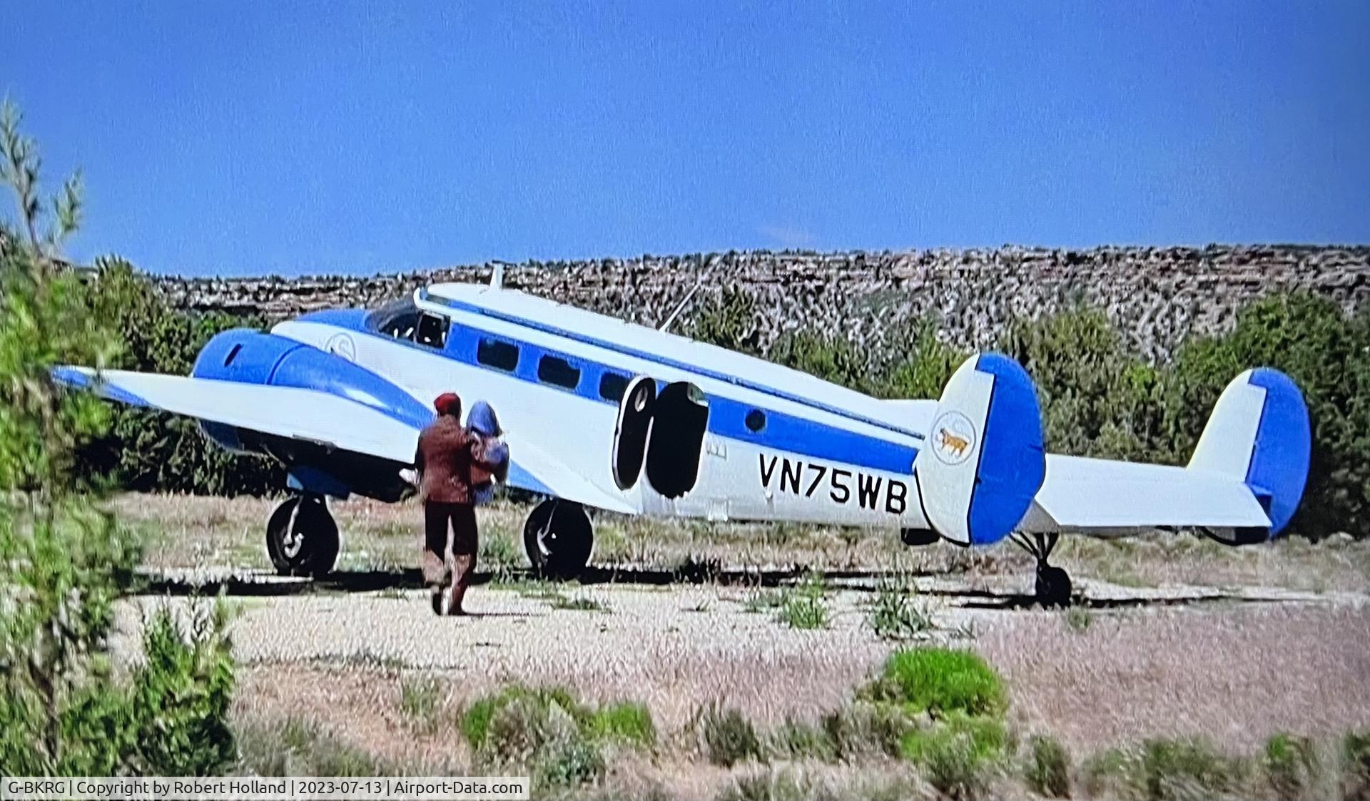 G-BKRG, 1951 Beech C-45H Expeditor C/N AF-222, Beech C-45, 51-11665 as used in the 1983 James Bond film Octopussy