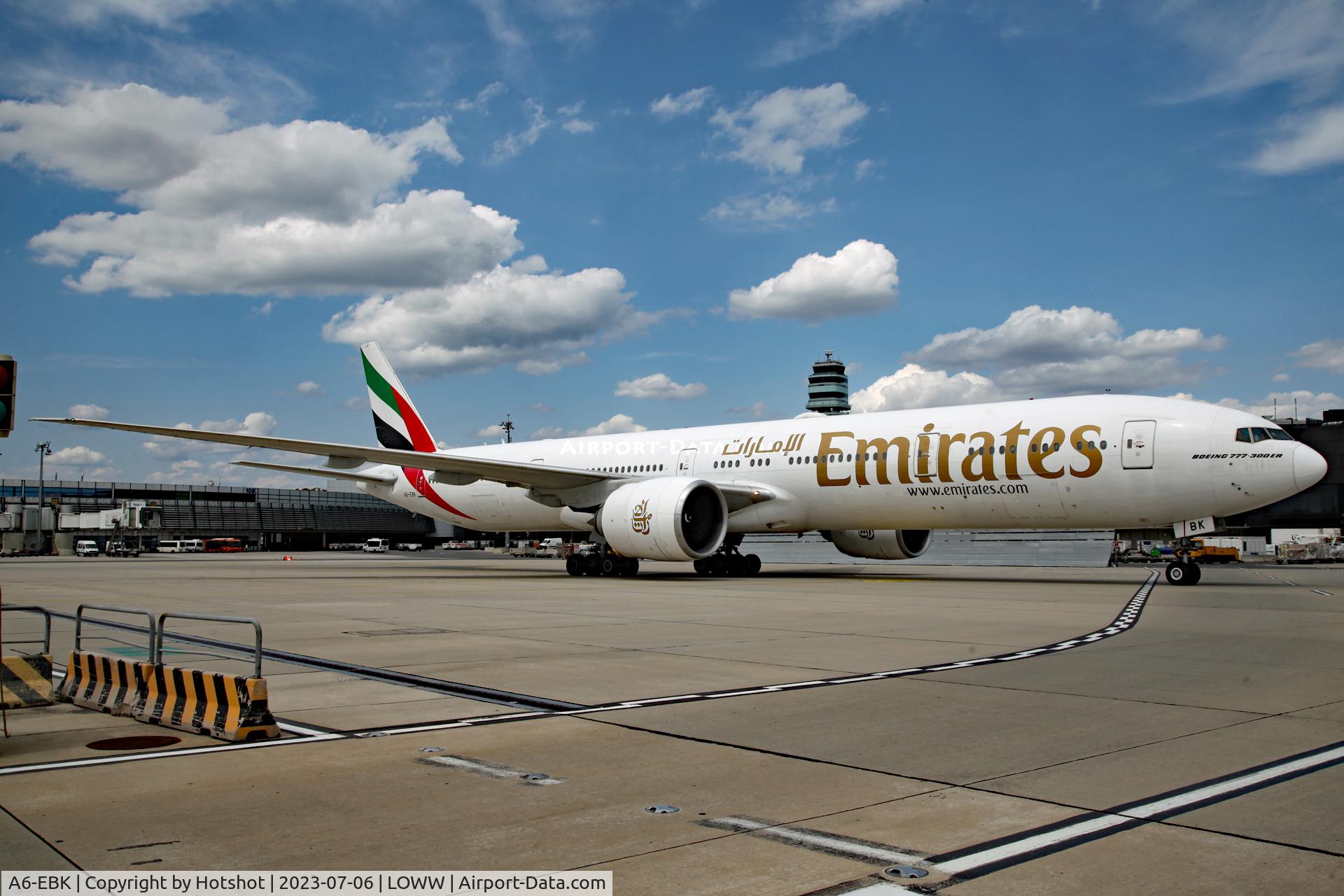 A6-EBK, 2006 Boeing 777-31H/ER C/N 34481, Looking fancy in front of the tower, but the aircraft from close-up looks already a bit worn