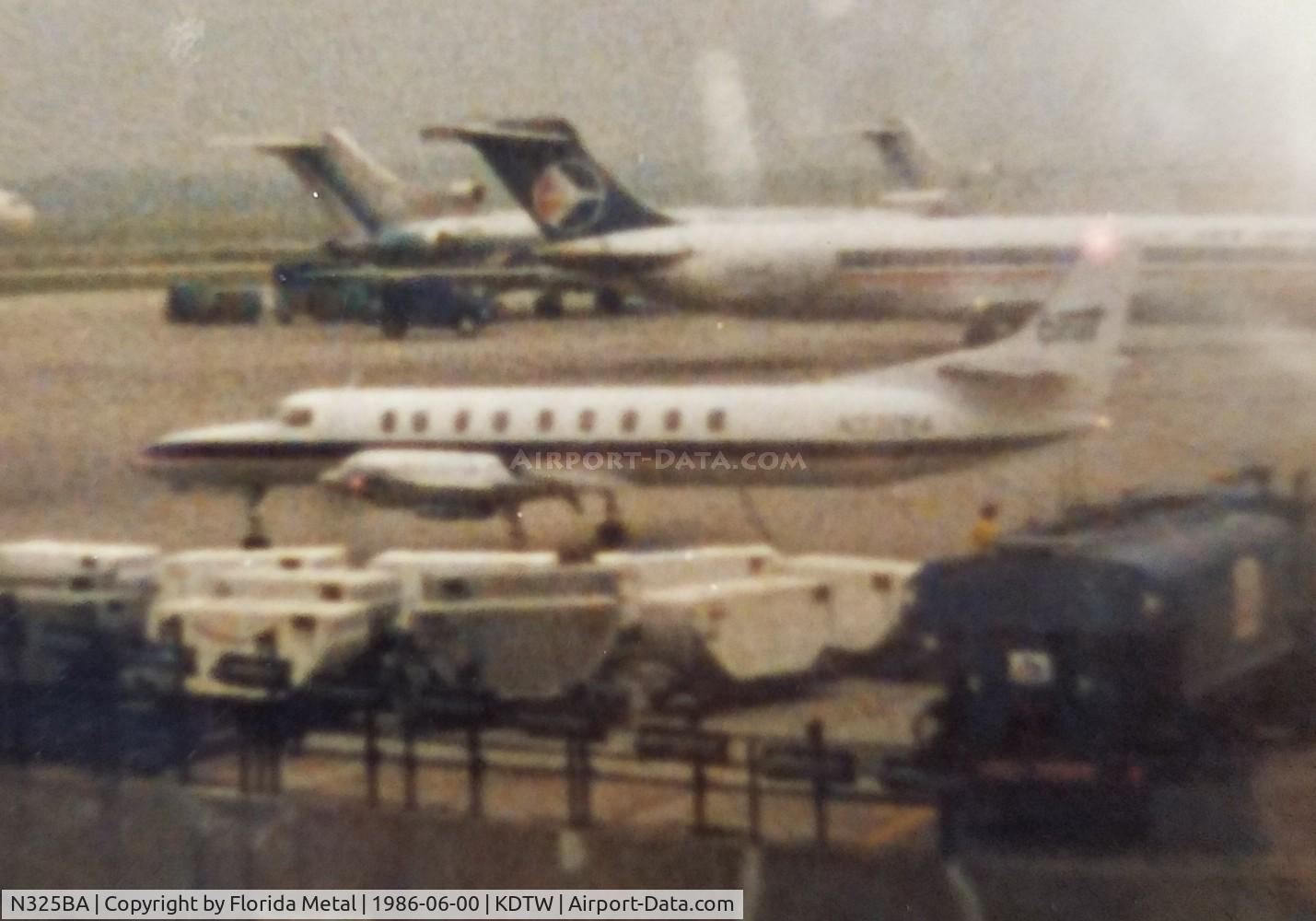 N325BA, 1979 Swearingen SA226TC C/N TC304, Britt Airways SA226TC zx DTW 1986 - used a flash, ruined the already grainy picture
