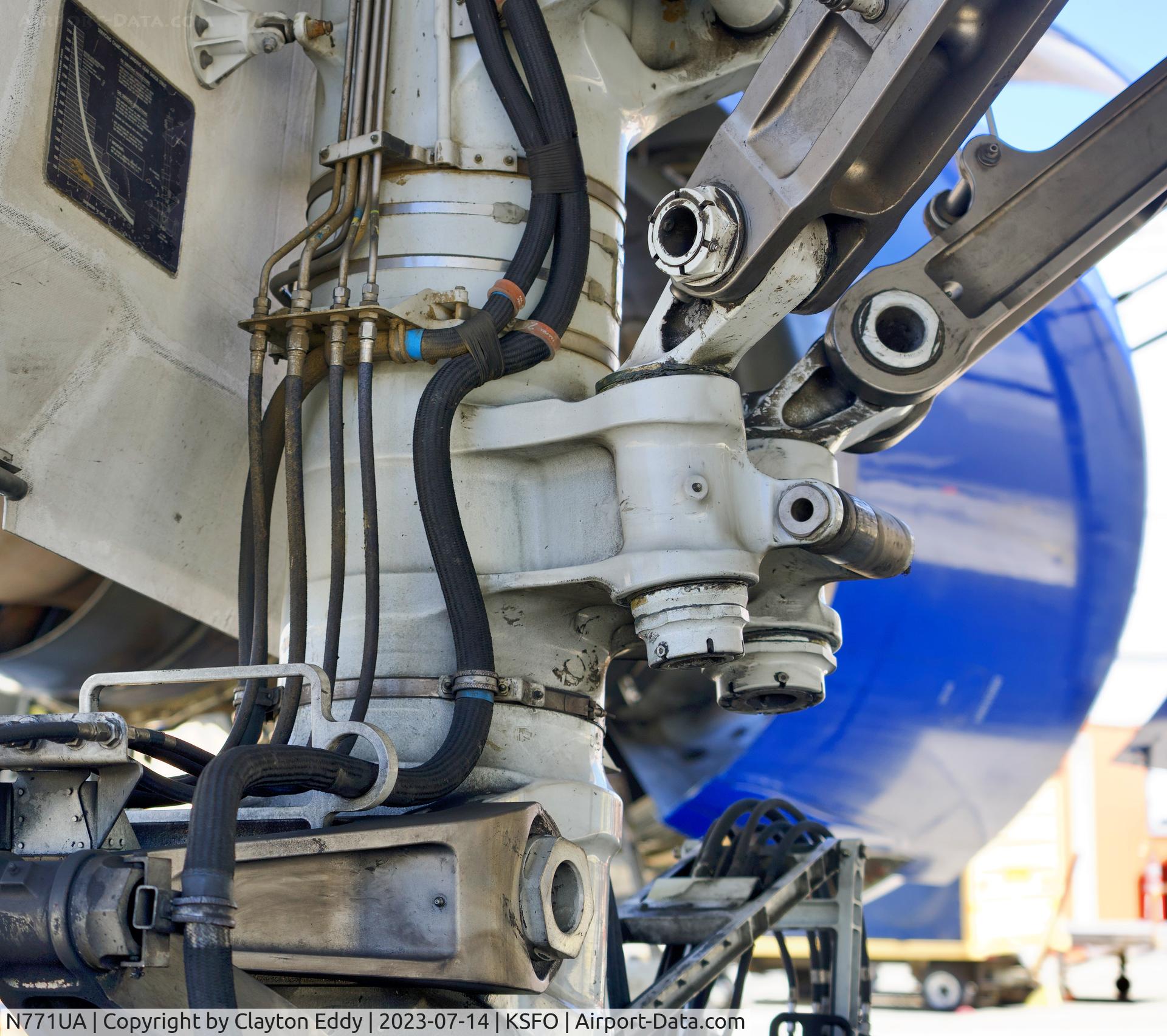 N771UA, 1995 Boeing 777-222 C/N 26932, Main gear. SFO 2023.