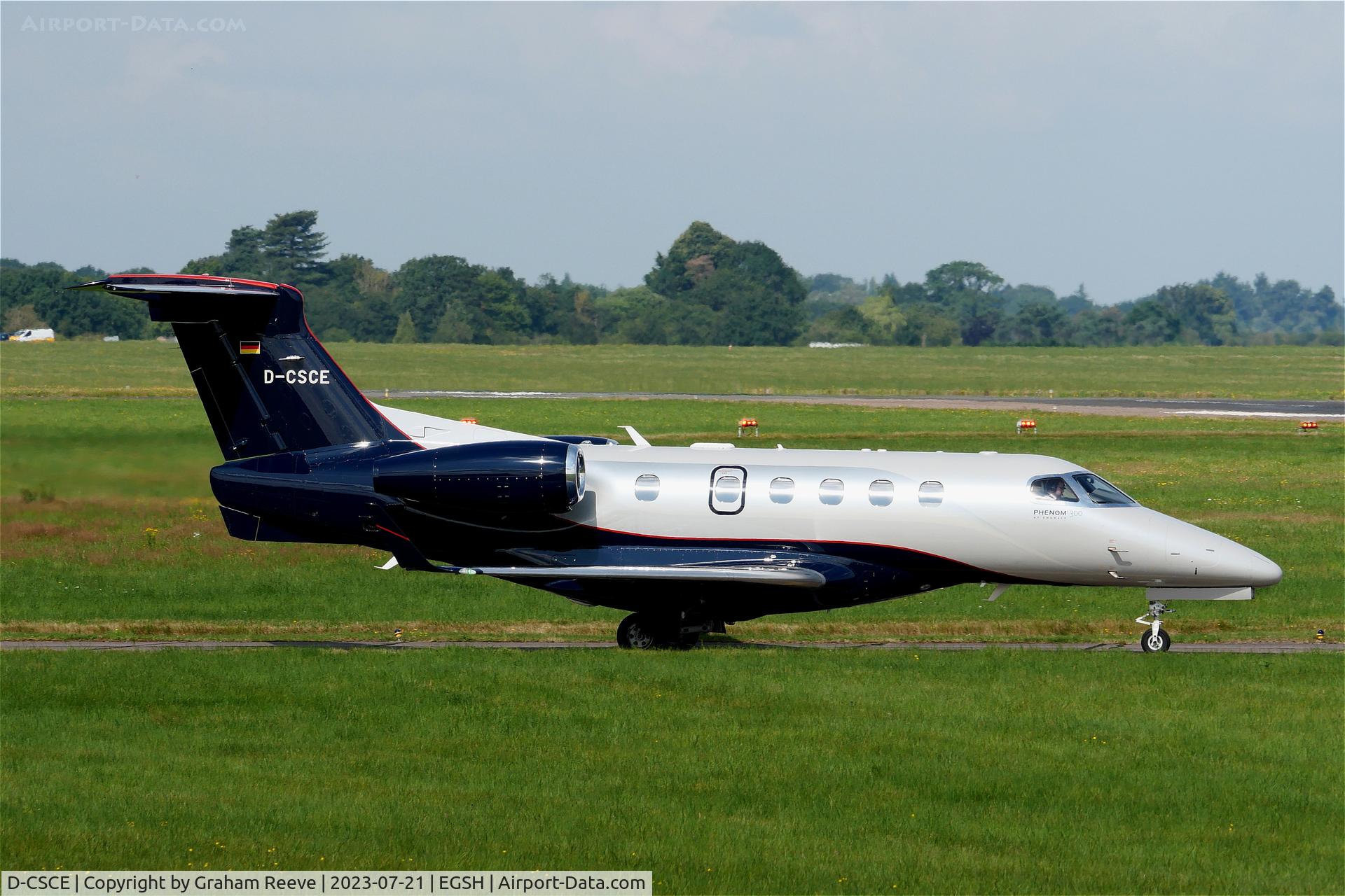 D-CSCE, 2017 Embraer EMB-550 Phenom 300 C/N 50500424, Departing from Norwich.