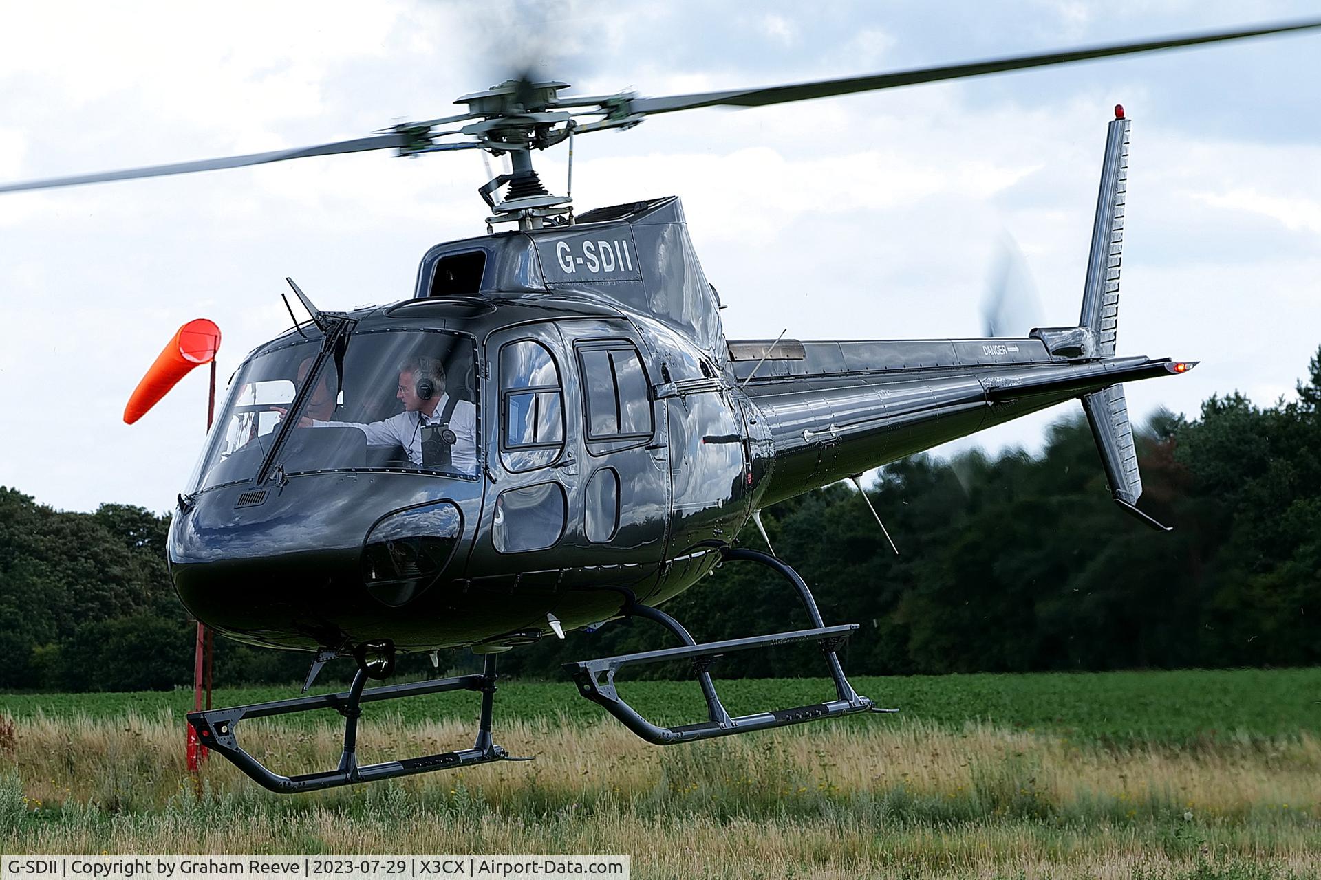 G-SDII, 1994 Aerospatiale AS-350B-2 Ecureuil C/N 2825, Departing from Northrepps.