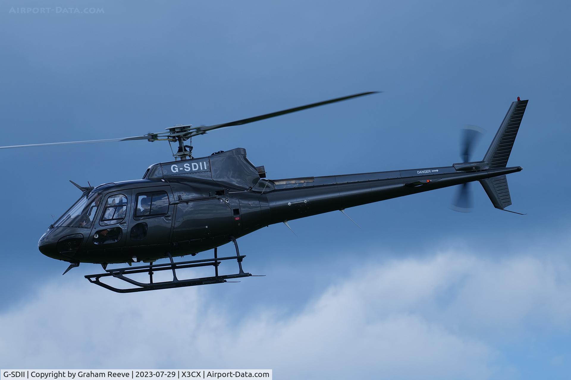 G-SDII, 1994 Aerospatiale AS-350B-2 Ecureuil C/N 2825, Departing from Northrepps.