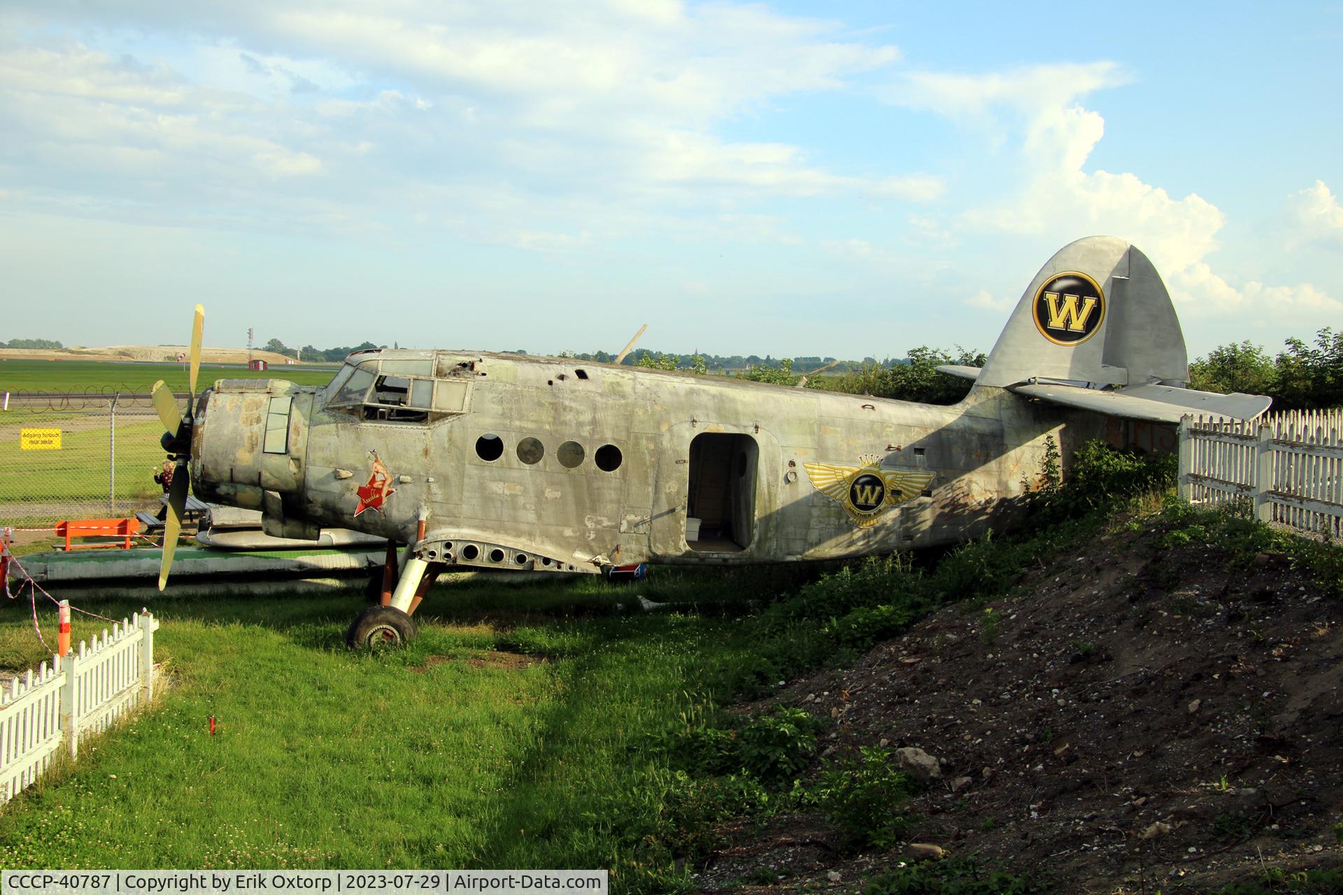 CCCP-40787, 1977 WSK--PZL AN-2R C/N 1G173-14, The AN-2 off airport 29july23. Placed at a small resturant 