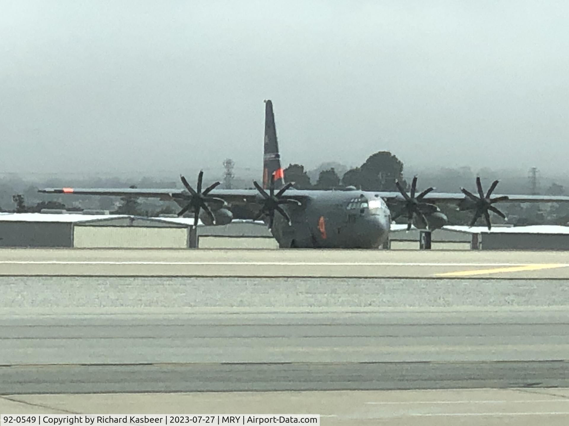 92-0549, 1992 Lockheed C-130H Hercules C/N 382-5337, View from departures lounge. Unknown to photographer whether this is here for potential fire service or routine Air Force operations.