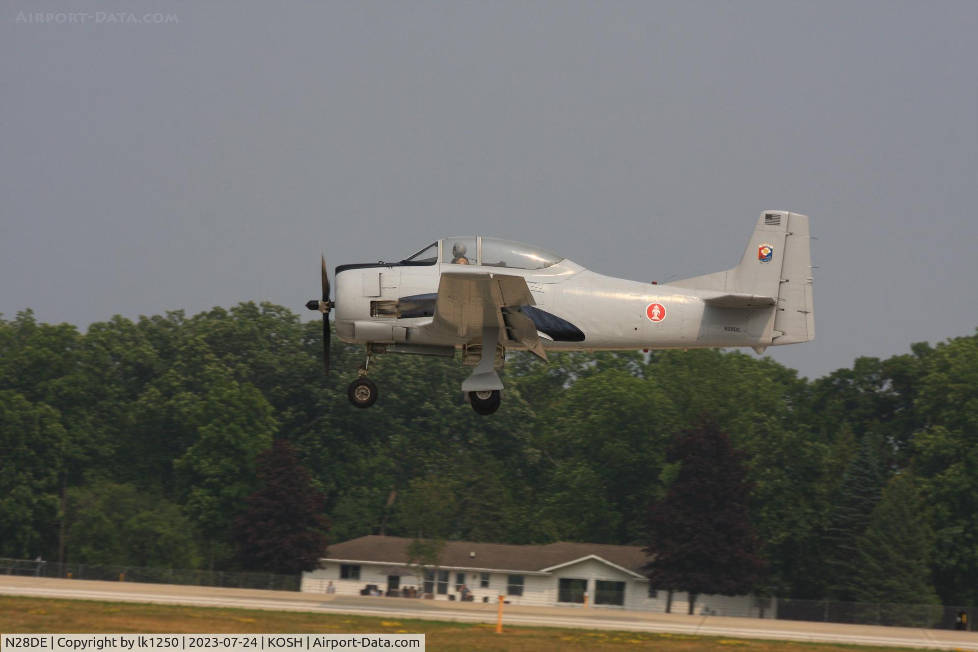 N28DE, North American T-28B Trojan C/N 200-346, This T-28 was painted in the colours of the Laotian Air Force when it visited EAA Air Venture in 1923