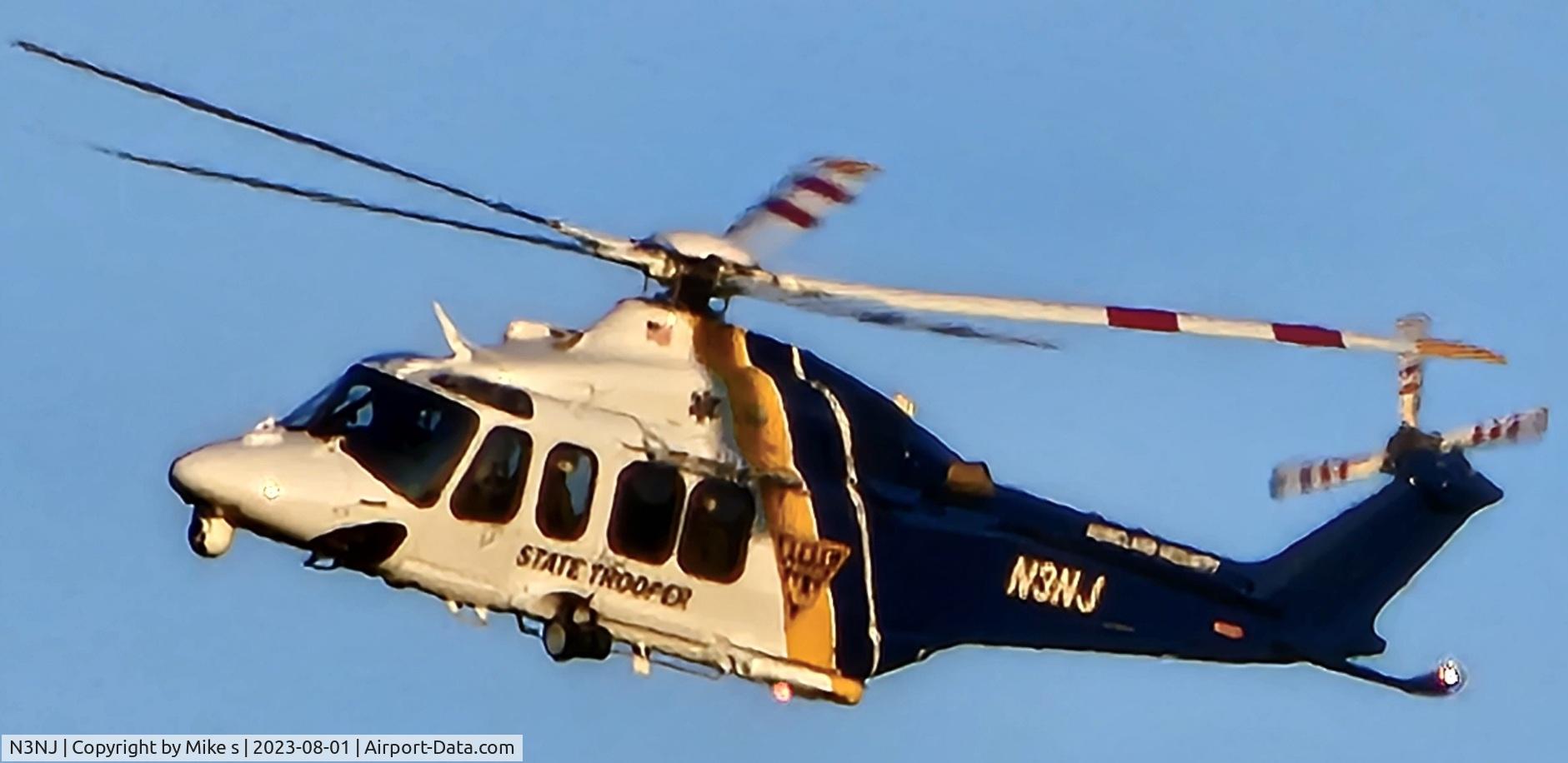 N3NJ, 2013 AgustaWestland AW-139 C/N 41293, Over the center of town in Denville