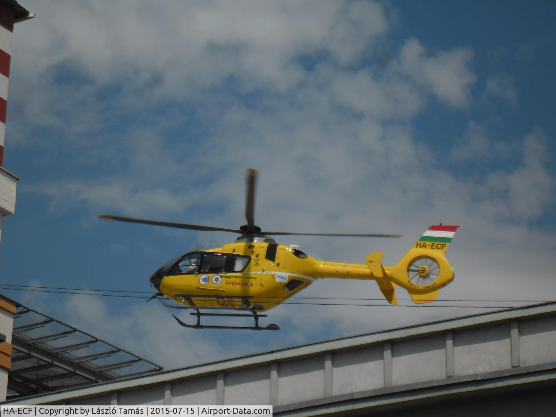 HA-ECF, 2004 Eurocopter EC-135T-2 C/N 0368, EC-135 landing on the hospital helipad.