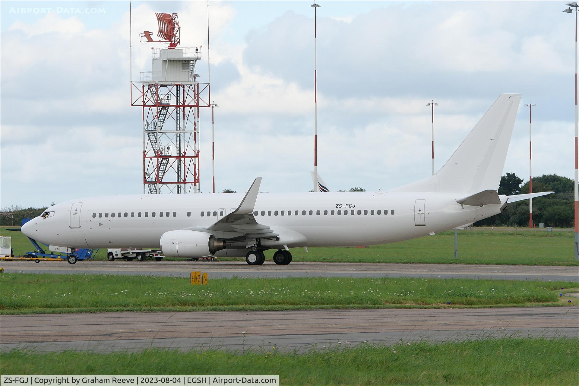 ZS-FGJ, 2009 Boeing 737-800 C/N 37542, Under tow at Norwich.