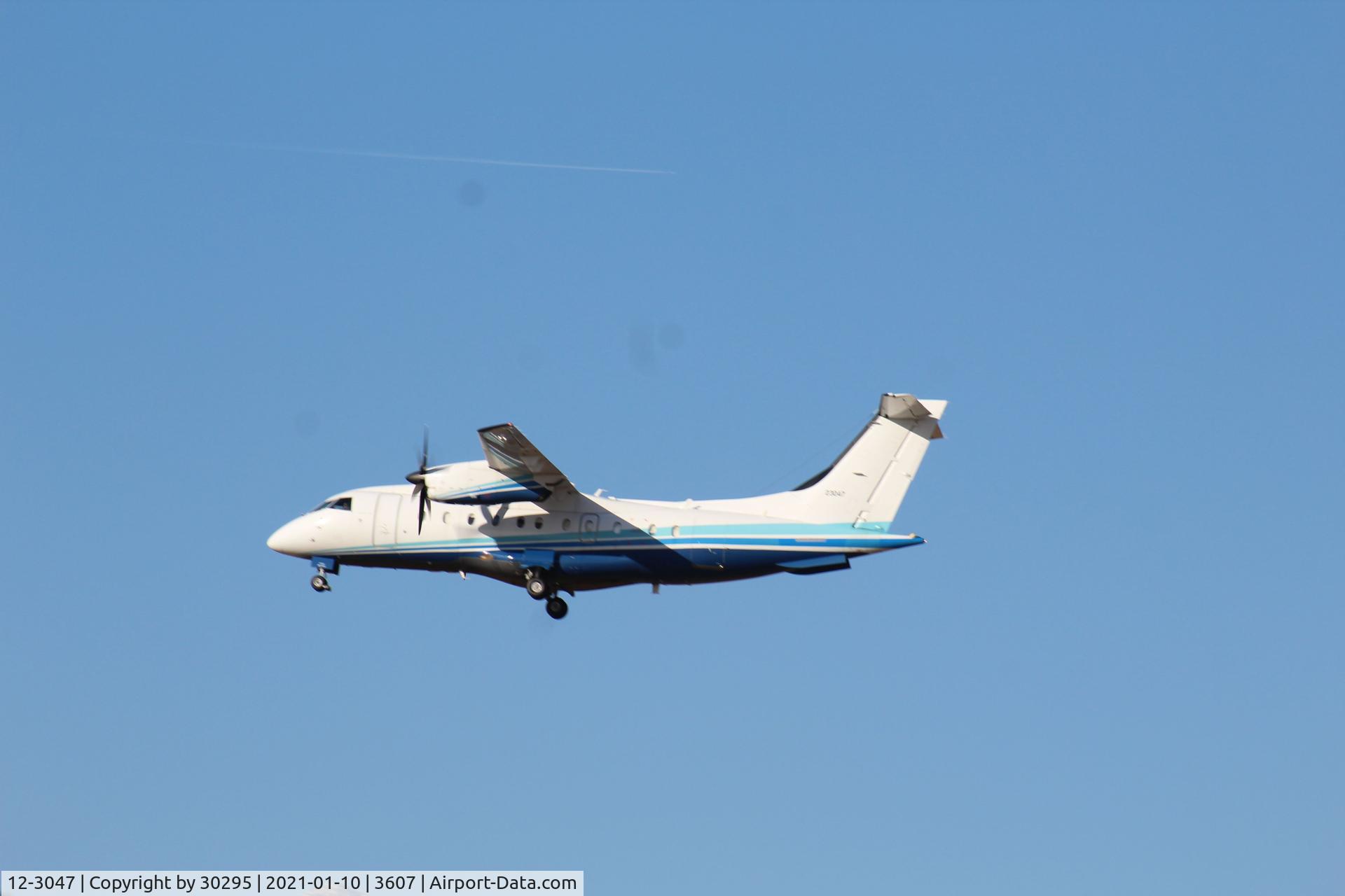 12-3047, 1995 Dornier 328-100 (C-146A Wolfhound) C/N 3047, Approaching the outer fence