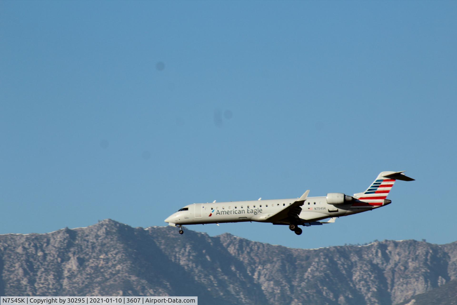 N754SK, 2005 Bombardier CRJ-701 (CL-600-2C10) Regional Jet C/N 10215, Approaching outer fence