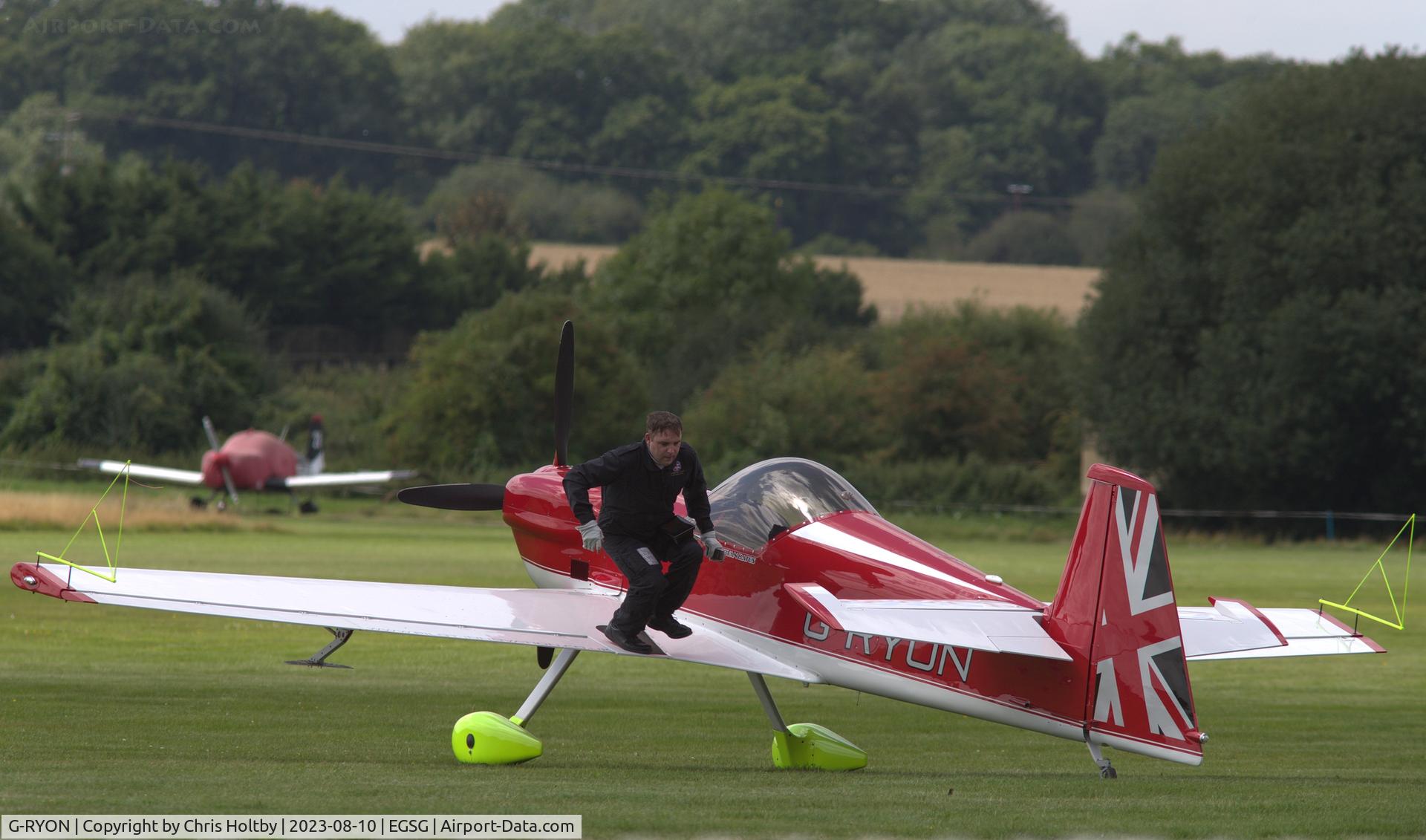 G-RYON, 1988 Mudry CAP-231 C/N 07, Pilot in a quick dismount from his 1988 Mudry Cap 231 at Stapleford Tawney, Essex