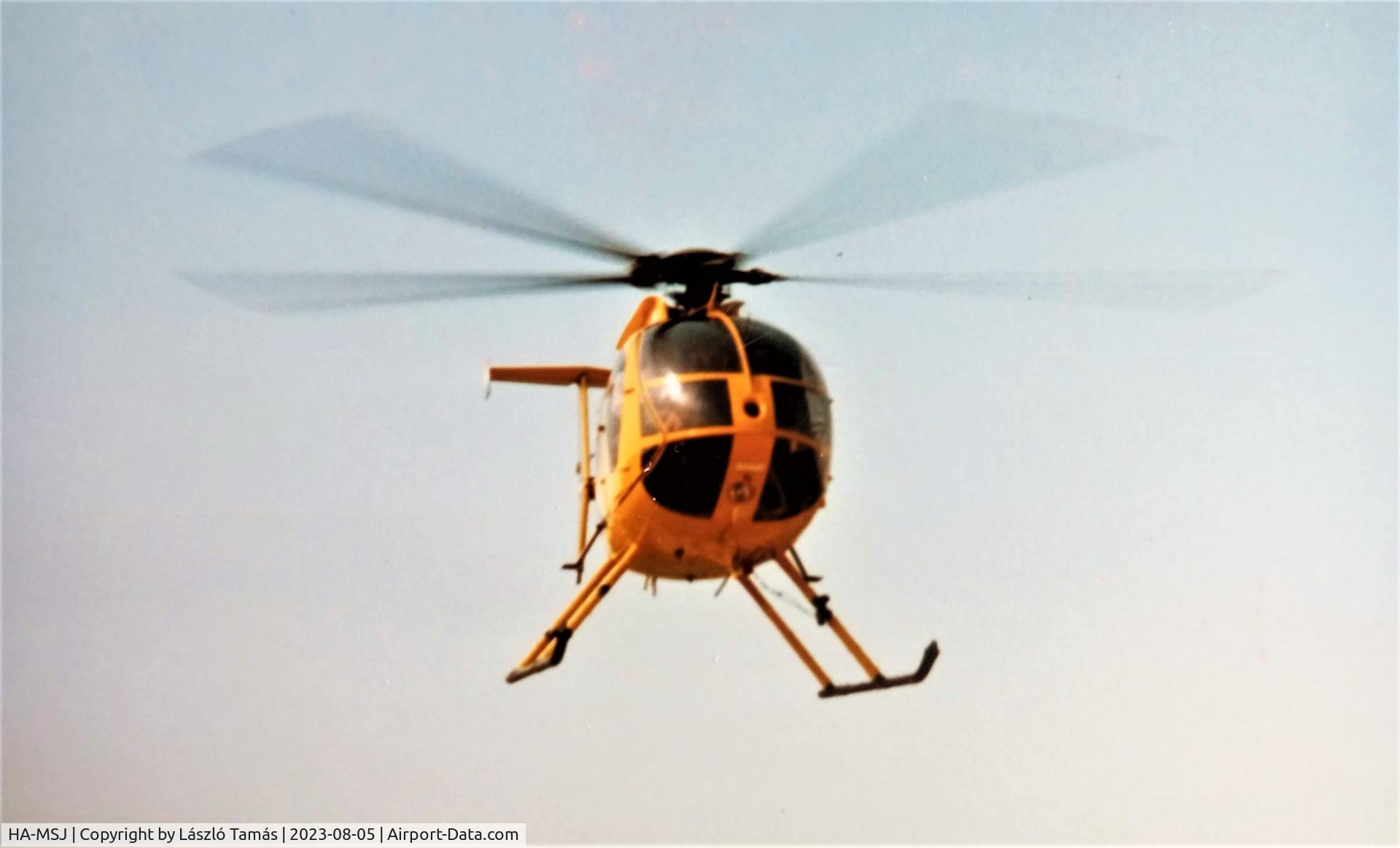 HA-MSJ, 1988 McDonnell Douglas 500-E C/N 0311E, MD-500E landing somewhere in Hungary (early 1990's)