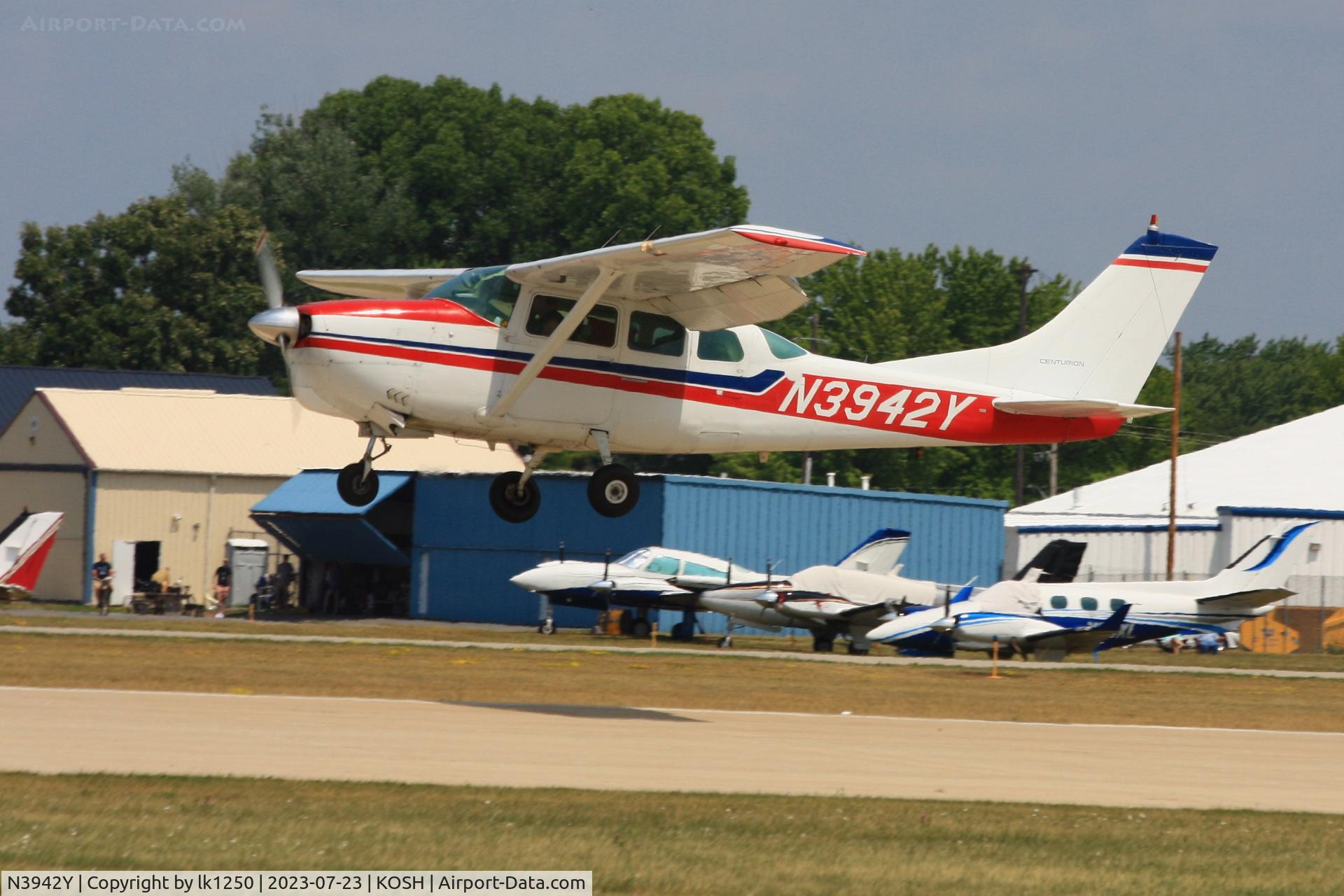 N3942Y, 1964 Cessna 210D Centurion C/N 21058442, This Cessna Centurion in landing for EAA AirVenture 2023