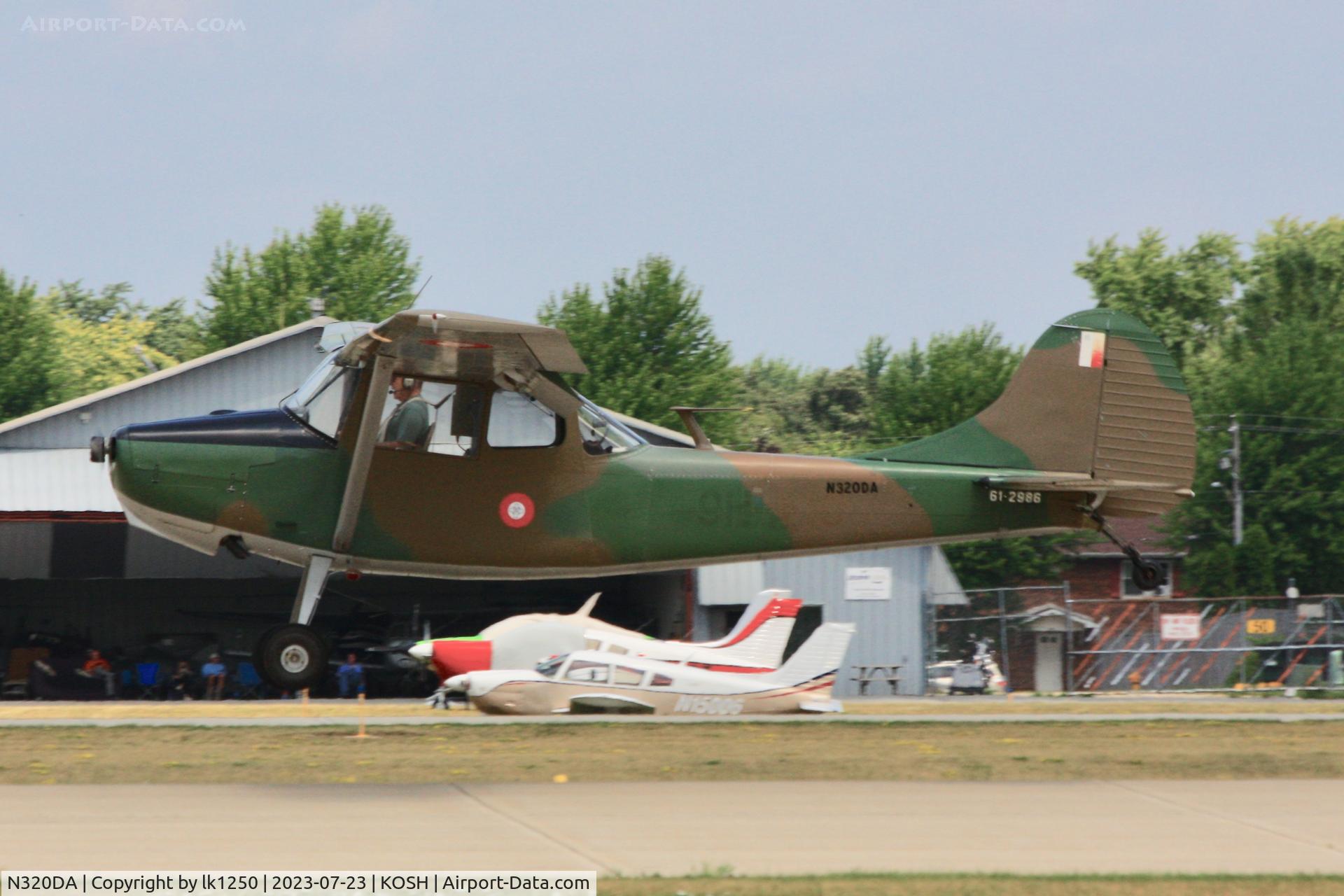 N320DA, 1961 Cessna L-19E Bird Dog C/N 61-2986 (305M-0032), This Cessna O-1E N320DA is painted in the colours of the Malta Defence Force as 61-2986. Its actual c/n is 305M-0032. It came in for EAA AirVenutre 2023