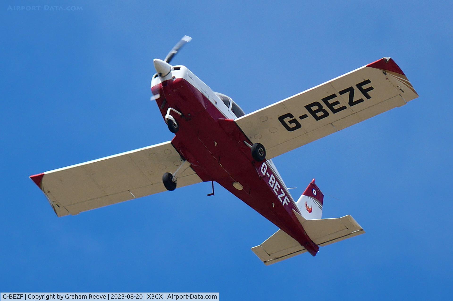 G-BEZF, 1974 Grumman American AA-5 Traveler C/N AA5-0538, Over head at Northrepps.