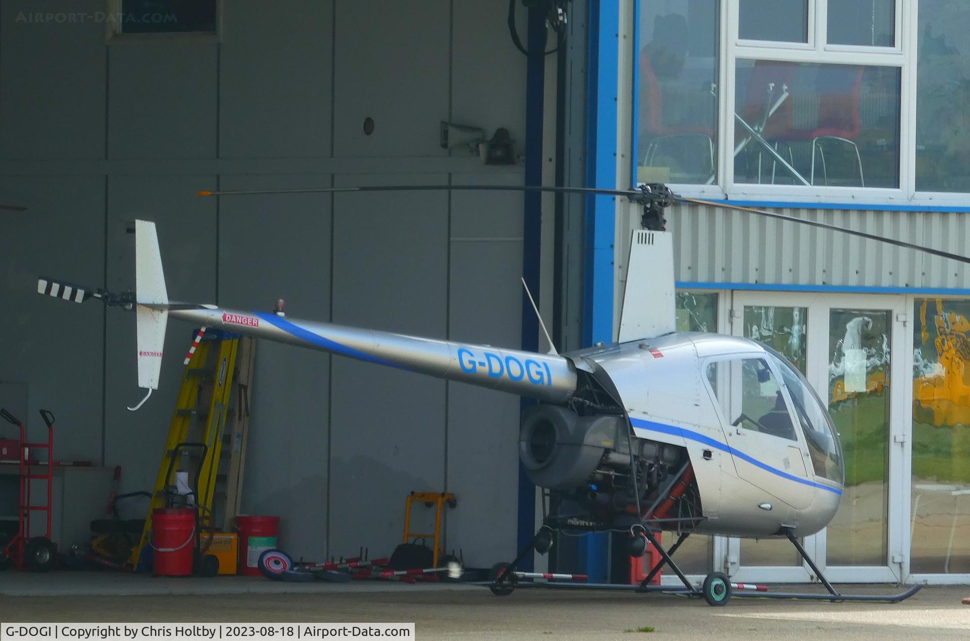 G-DOGI, 1993 Robinson R22 Beta C/N 2389, At Shoreham Airport E Sussex.