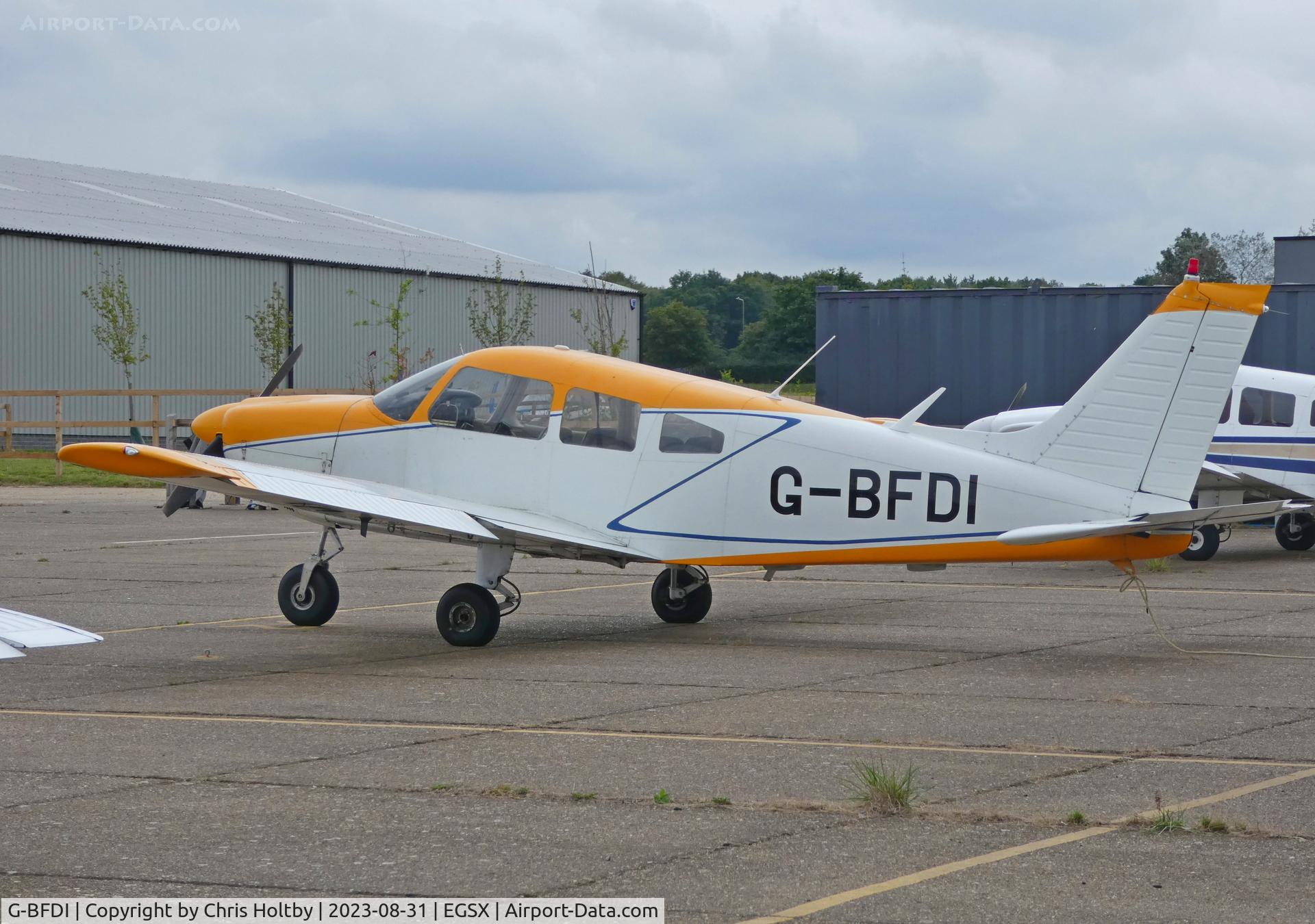 G-BFDI, 1977 Piper PA-28-181 Cherokee Archer II C/N 28-7790382, Parked at North Weald, Essex